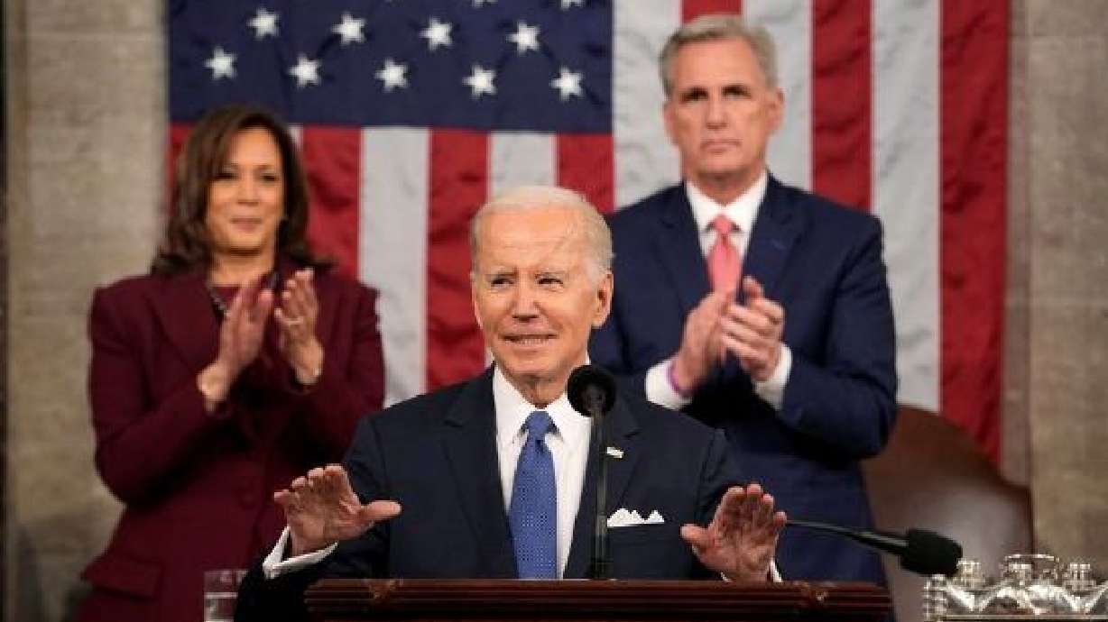 President Joe Biden delivers the State of the Union address to a joint session of Congress at the U.S. Capitol, Tuesday in Washington as Vice President Kamala Harris and House Speaker Kevin McCarthy of Calif., applaud.