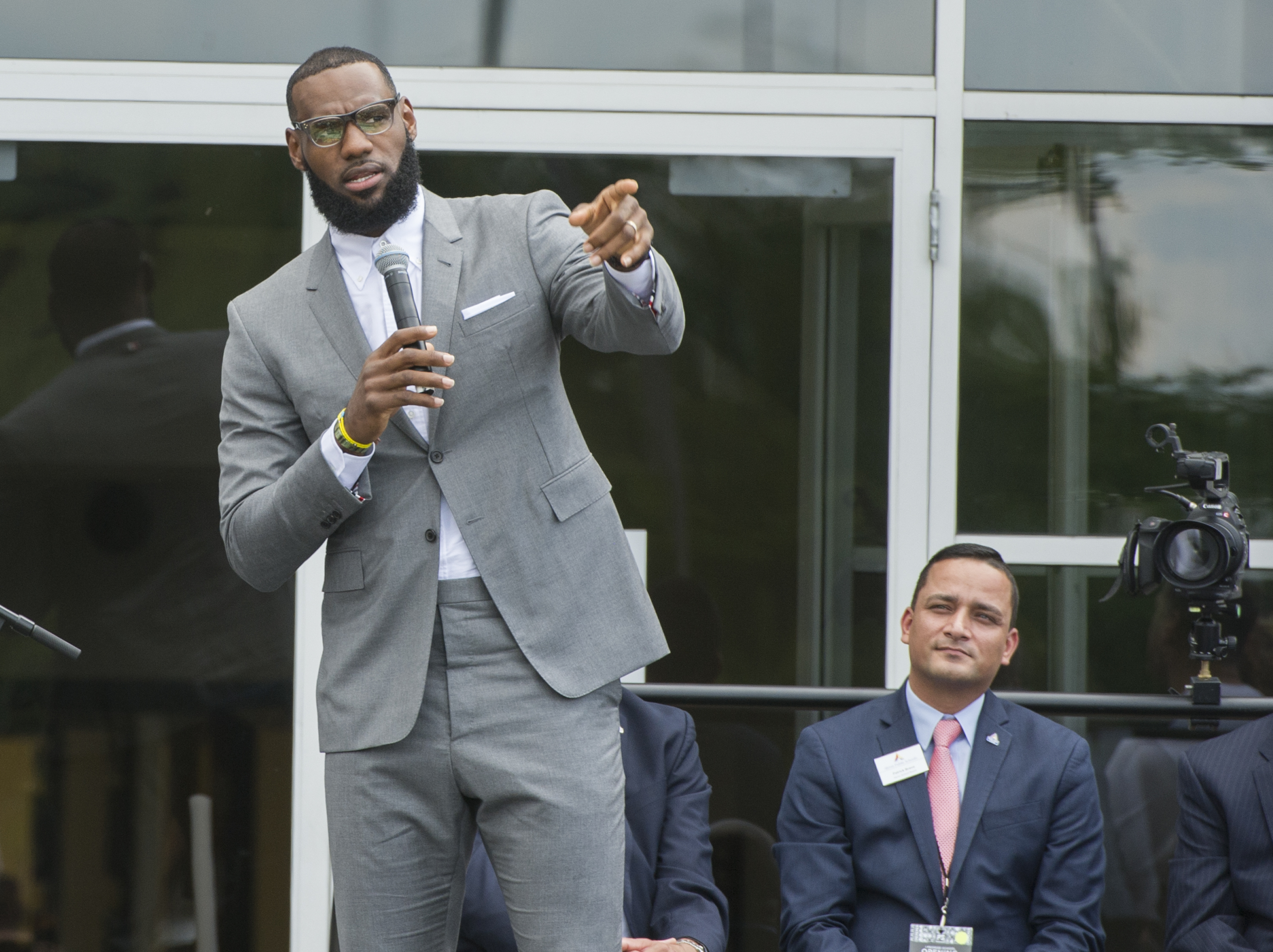 FILE -LeBron James speaks at the opening ceremony for the I Promise School in Akron, Ohio, Monday, July 30, 2018. The I Promise School is supported by the The LeBron James Family Foundation and is run by the Akron Public Schools. LeBron James is soon going to be in the NBA record books as the most prolific scorer ever. But for all his accomplishments on the basketball court, it is James’ ambitious pursuits off-the-court that may ultimately distinguish his legacy from other superstar athletes’.