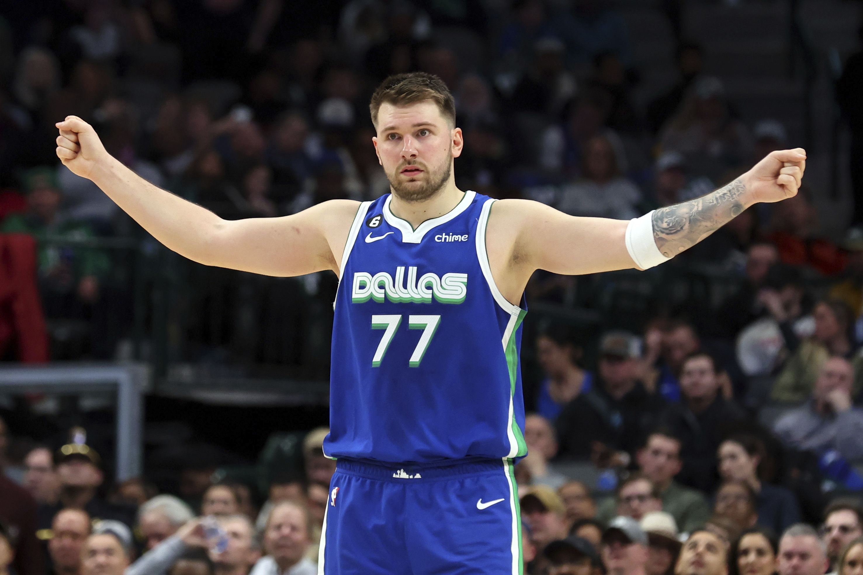 Dallas Mavericks guard Luka Doncic gestures on the court in the second half of an NBA basketball game against the Detroit Pistons, Monday, Jan. 30, 2023, in Dallas. 