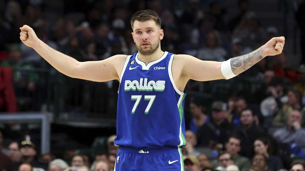 Dallas Mavericks guard Luka Doncic gestures on the court in the second half of an NBA basketball game against the Detroit Pistons, Monday, Jan. 30, 2023, in Dallas.