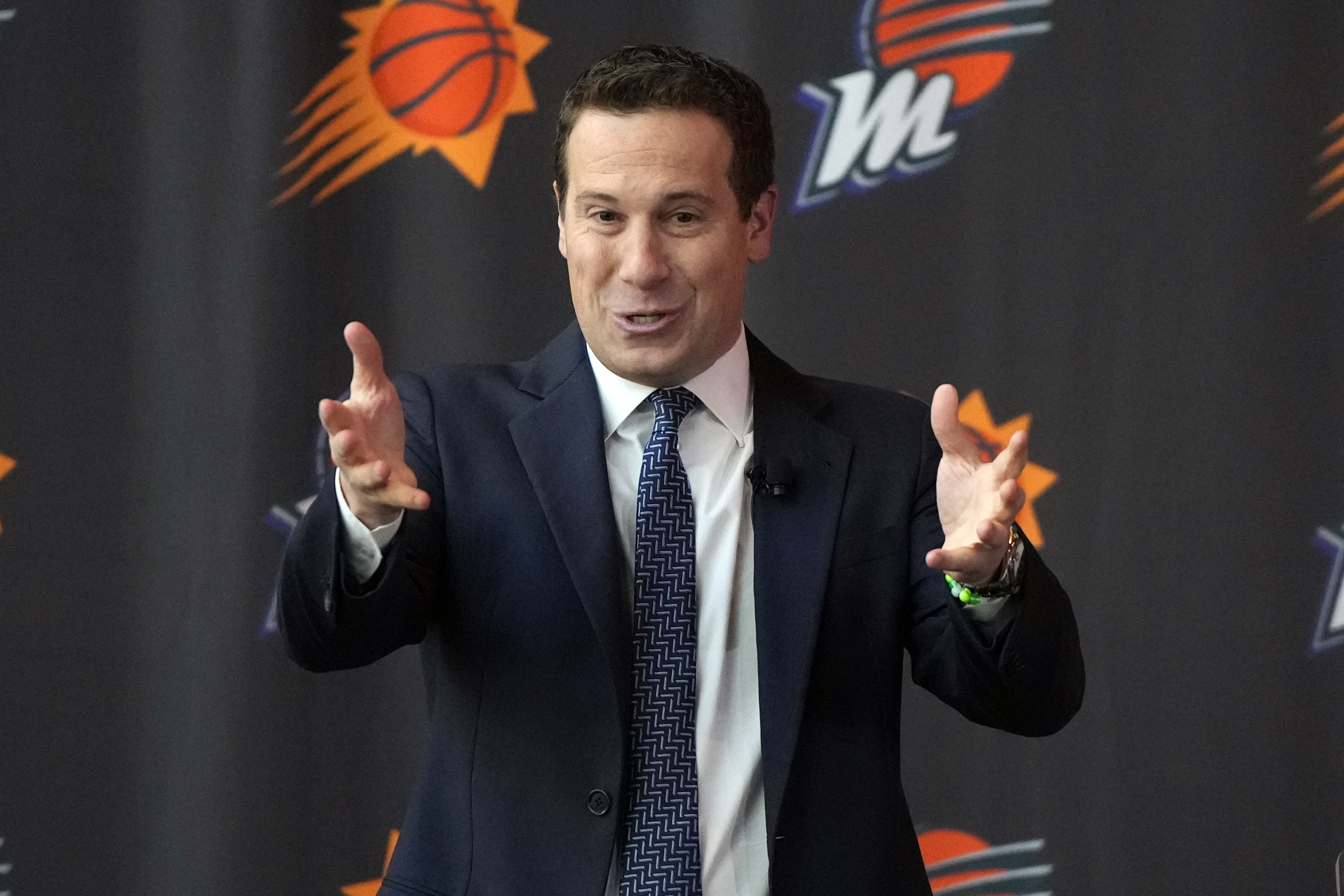 Mat Ishbia, new controlling interest owner of the Phoenix Suns and Phoenix Mercury, talks to the media during a basketball news conference, Wednesday, Feb. 8, 2023, in Phoenix. 