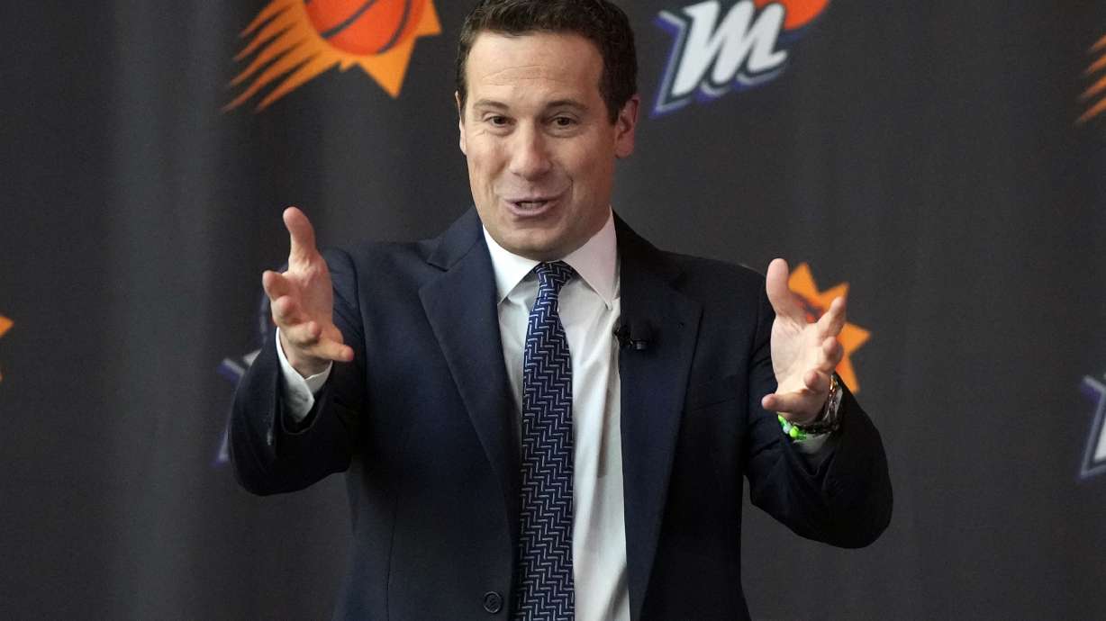 Mat Ishbia, new controlling interest owner of the Phoenix Suns and Phoenix Mercury, talks to the media during a basketball news conference, Wednesday, Feb. 8, 2023, in Phoenix.