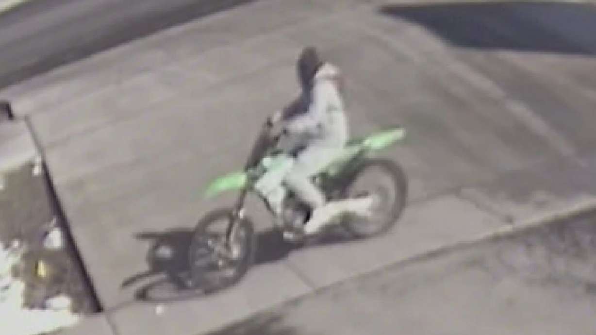 U.S. Postal Inspection Service officials say they are looking for the individual seen riding a dirt bike in connection with the robbery of a U.S. Postal Service employee in Salt Lake City on Tuesday.