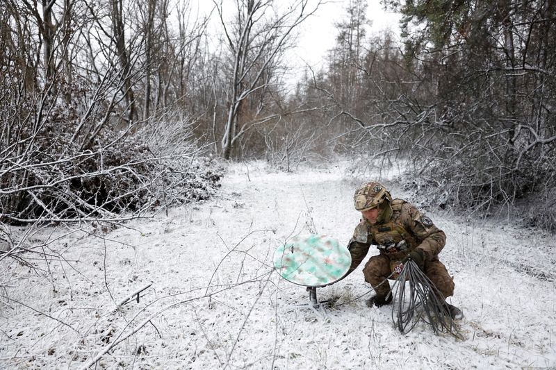 A member of the 80th Separate Air Assault Brigade disconnects their Starlink on the front line at Kreminna, Ukraine, Jan. 6. SpaceX has taken steps to prevent Ukraine's military from using the company's Starlink satellite internet service, SpaceX's president said Wednesday.