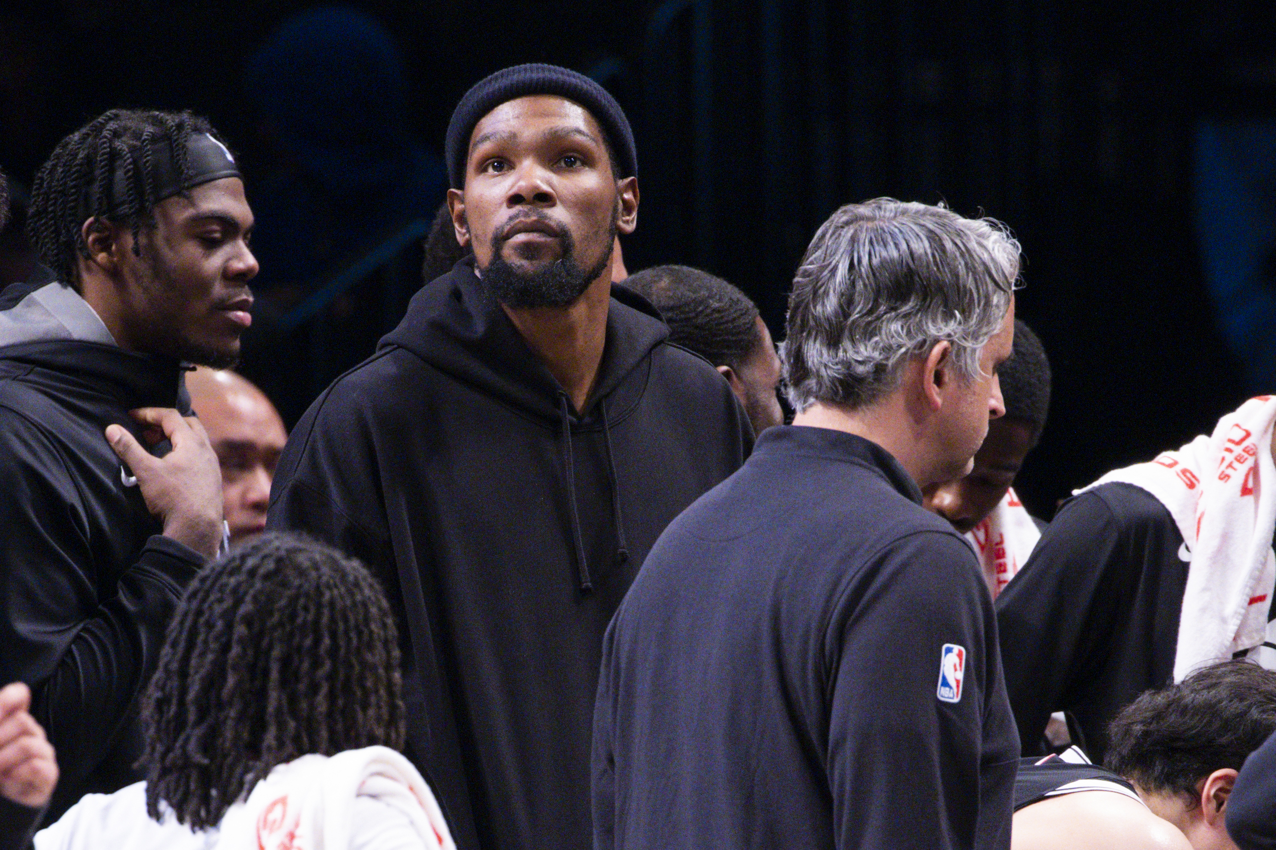 Brooklyn Nets forward Kevin Durant, center, looks on from the bench during the second half of an NBA basketball game against the Los Angeles Lakers, Monday, Jan. 30, 2023, in New York. 