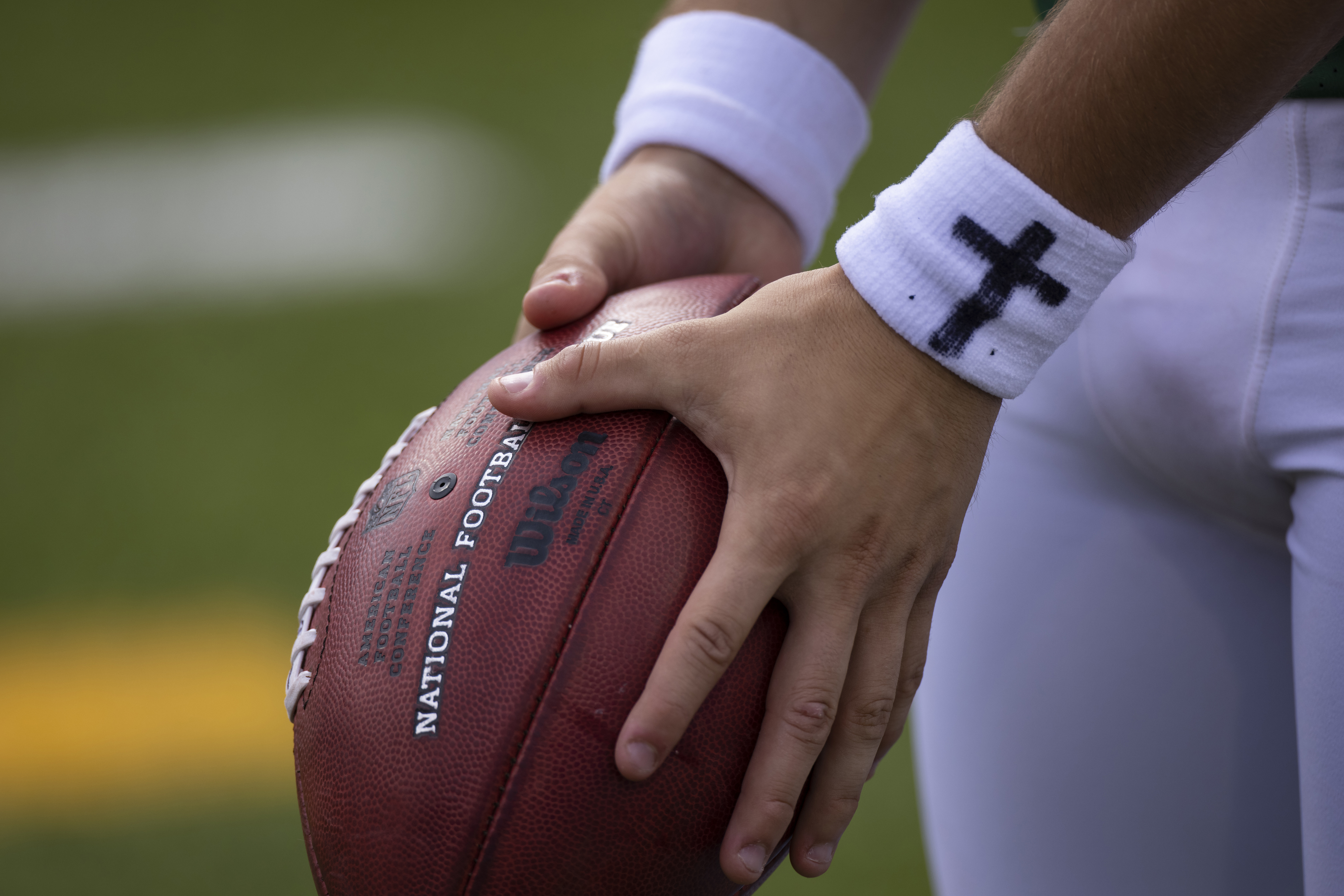 FILE - New York Jets punter Braden Mann (7) practices holding for a kicker on the sideline during an NFL football game against the Buffalo Bills, Sunday, Sept. 13, 2020, in Orchard Park, N.Y. 