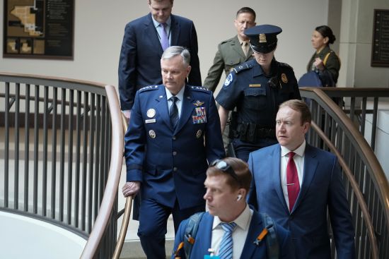 Lawmakers and intelligence advisers, including Gen. Glen VanHerck, left, commander of the United States Northern Command and North American Aerospace Defense Command, arrive for a closed briefing on the Chinese surveillance balloon that flew over the United States recently, at the Capitol in Washington, Thursday.