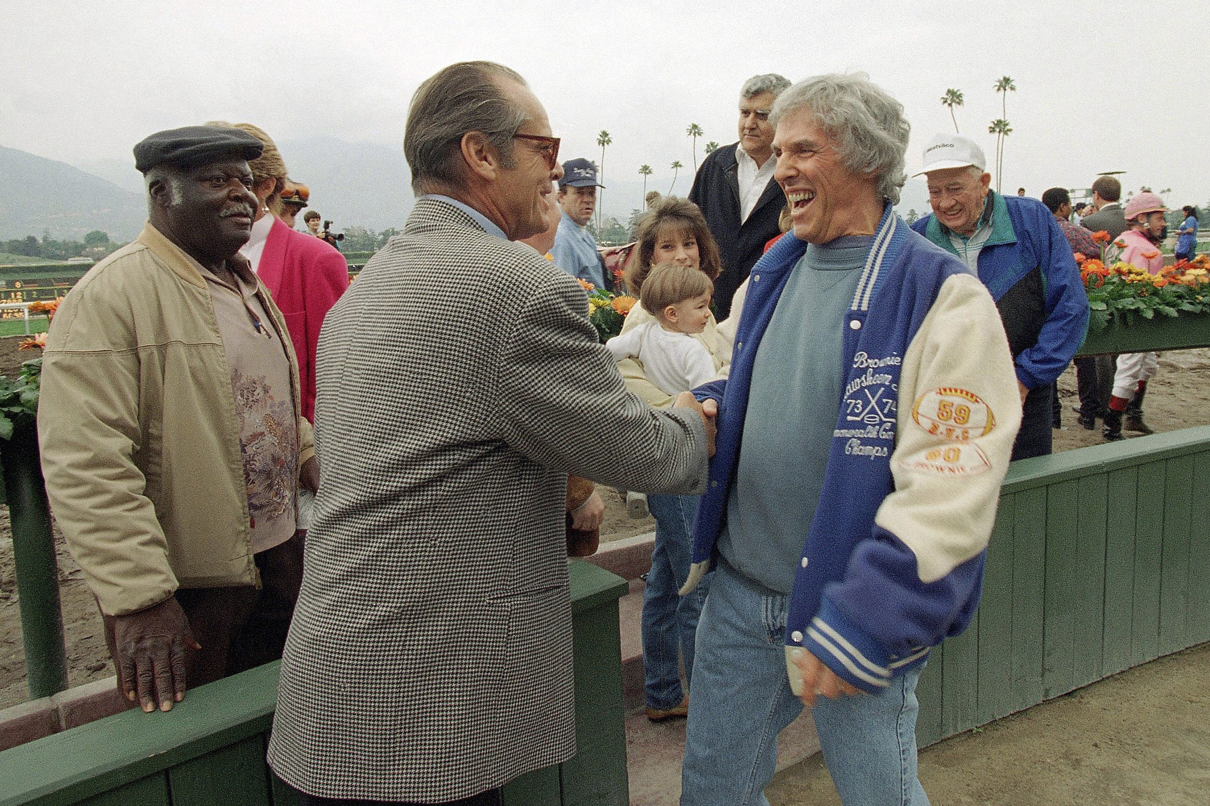 FILE - Actor Jack Nicholson, left, congratulates Academy Award-winner composer Burt Bacharach in the winner's circle after Bacharach's horse Soul of the Matter won the San Felipe Stakes horse race at Santa Anita on March 20, 1994, in Arcadia. Calif. Not all of Bacharach's hits were on the charts. The songwriter and pianist scored at the racetrack, too. Bacharach died Wednesday, Feb. 8, 2023, in Los Angeles of natural causes. He was 94.