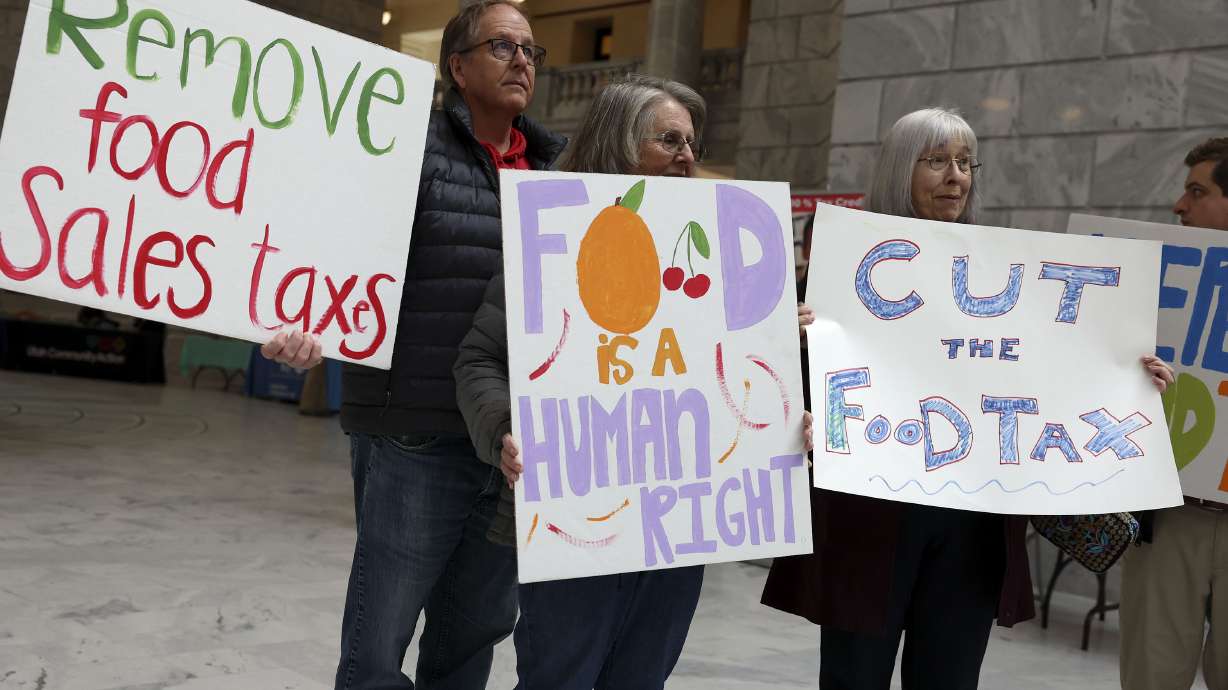 "More Bread for Utahns!" members Bill Hooper, Sharon Roper and Margo Markowski rally to repeal Utah's grocery sales tax at the Capitol in Salt Lake City on Thursday. Several community groups rallied with a pair of legislators in support of ending the state tax on food.