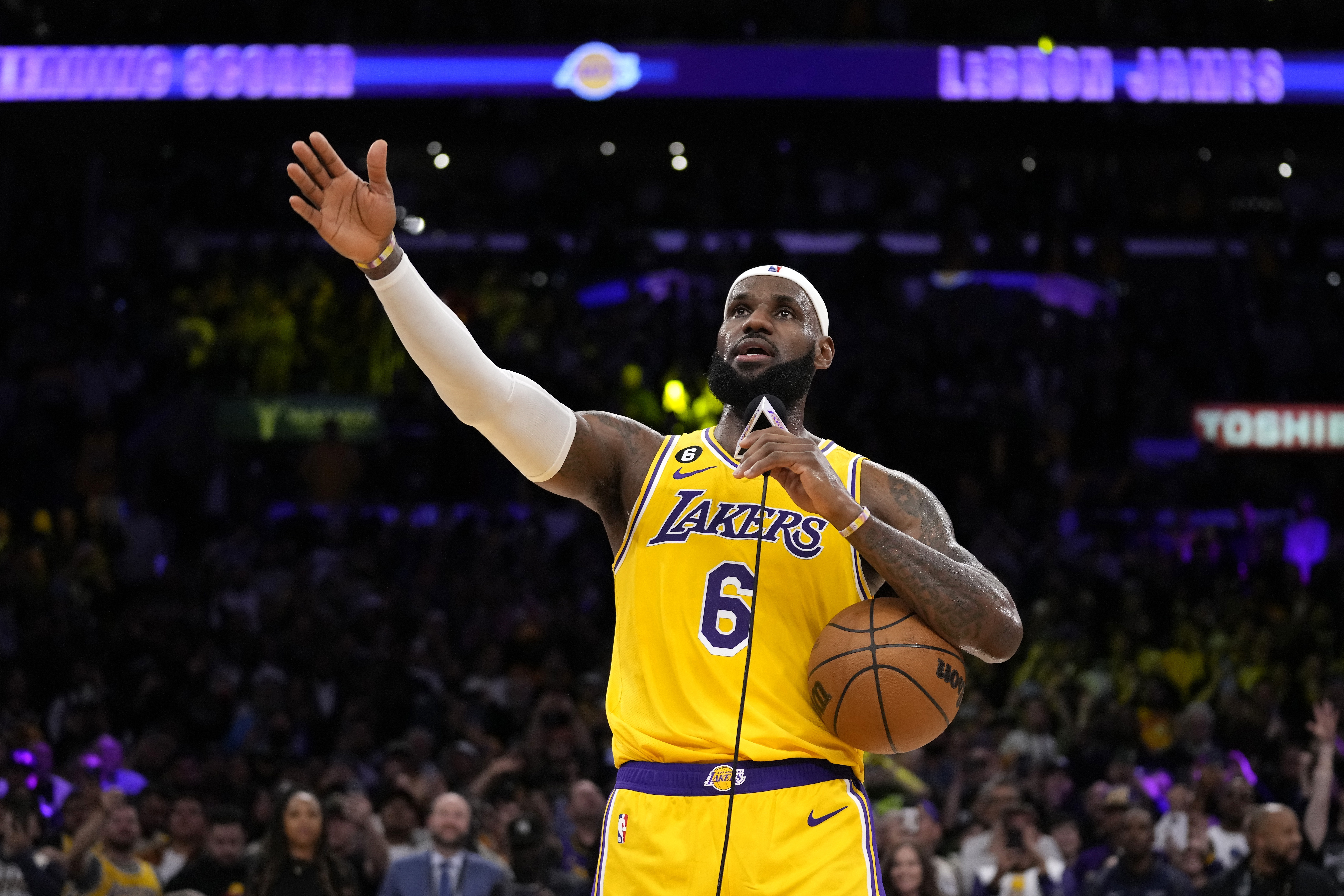 Los Angeles Lakers forward LeBron James speaks to fans after passing Kareem Abdul-Jabbar to become the NBA's all-time leading scorer during the second half of an NBA basketball game against the Oklahoma City Thunder Tuesday, Feb. 7, 2023, in Los Angeles. 