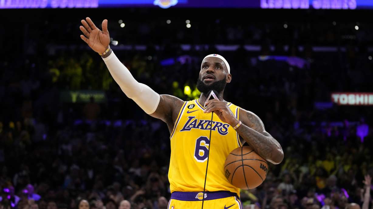 Los Angeles Lakers forward LeBron James speaks to fans after passing Kareem Abdul-Jabbar to become the NBA's all-time leading scorer during the second half of an NBA basketball game against the Oklahoma City Thunder Tuesday, Feb. 7, 2023, in Los Angeles.