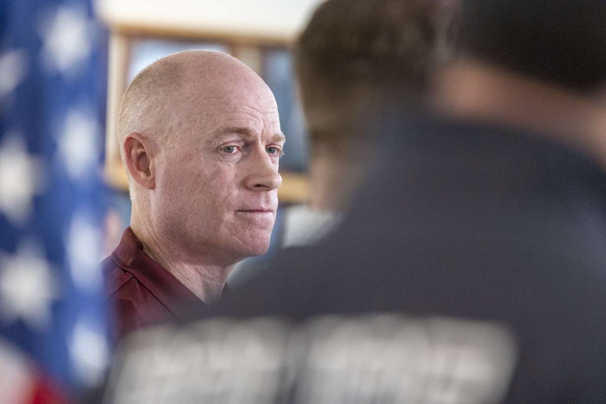 Enoch City Manager Rob Dotson listens to fellow city officials during a press conference regarding the killing of a family of seven and a relative in Enoch, Iron County, on Jan. 5.