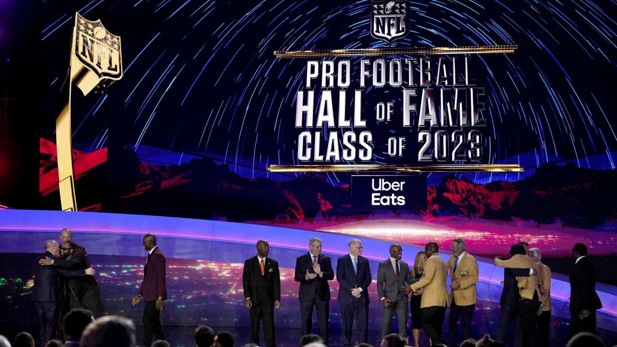 The Pro football Hall of Fame class of 2023 poses during the NFL Honors award show ahead of the Super Bowl 57 football game,Thursday, Feb. 9, 2023, in Phoenix.