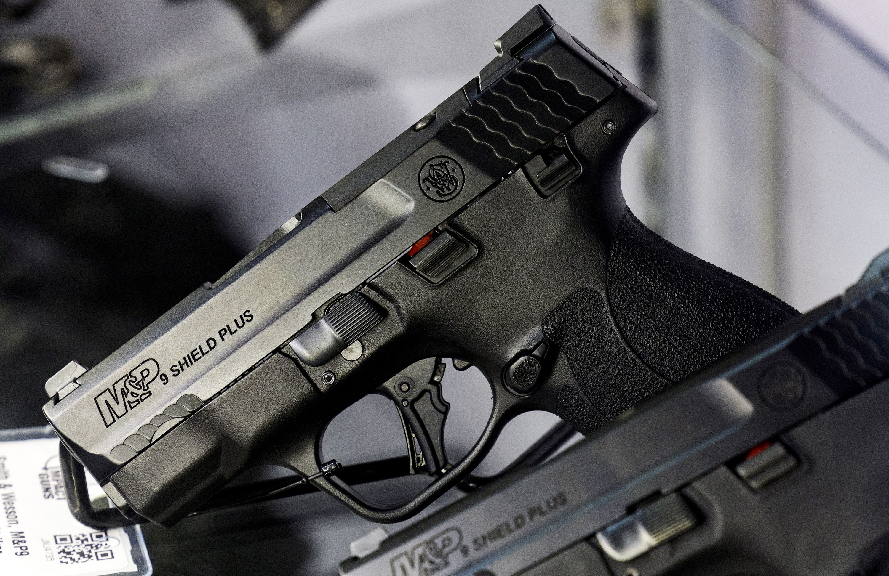 Smith and Wesson pistols are displayed at Impact Guns in South Salt Lake on July 6, 2022. Nearly half of Utah adults have a gun in their house, a poll says.