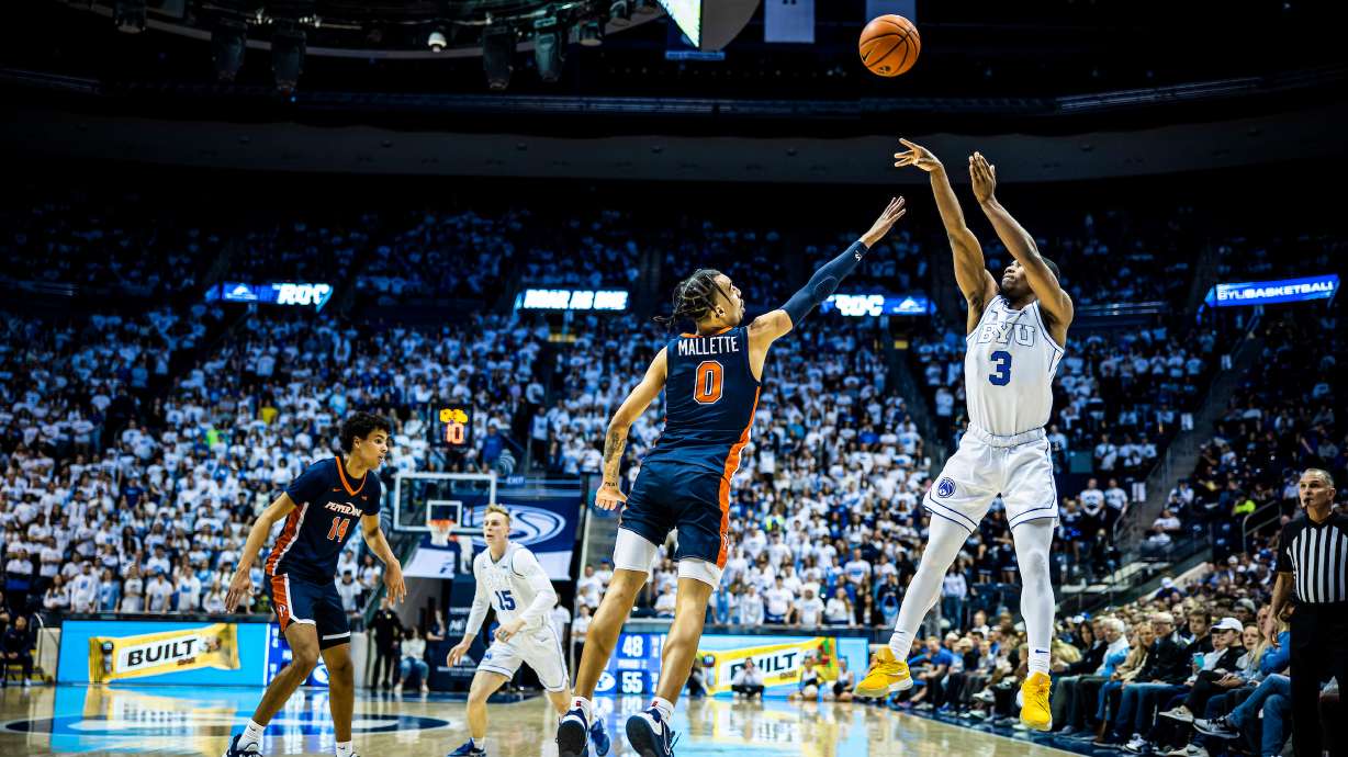 BYU guard Rudi Williams shoots against Pepperdine, Saturday, Jan. 14, 2023 at the Marriott Center in Provo.