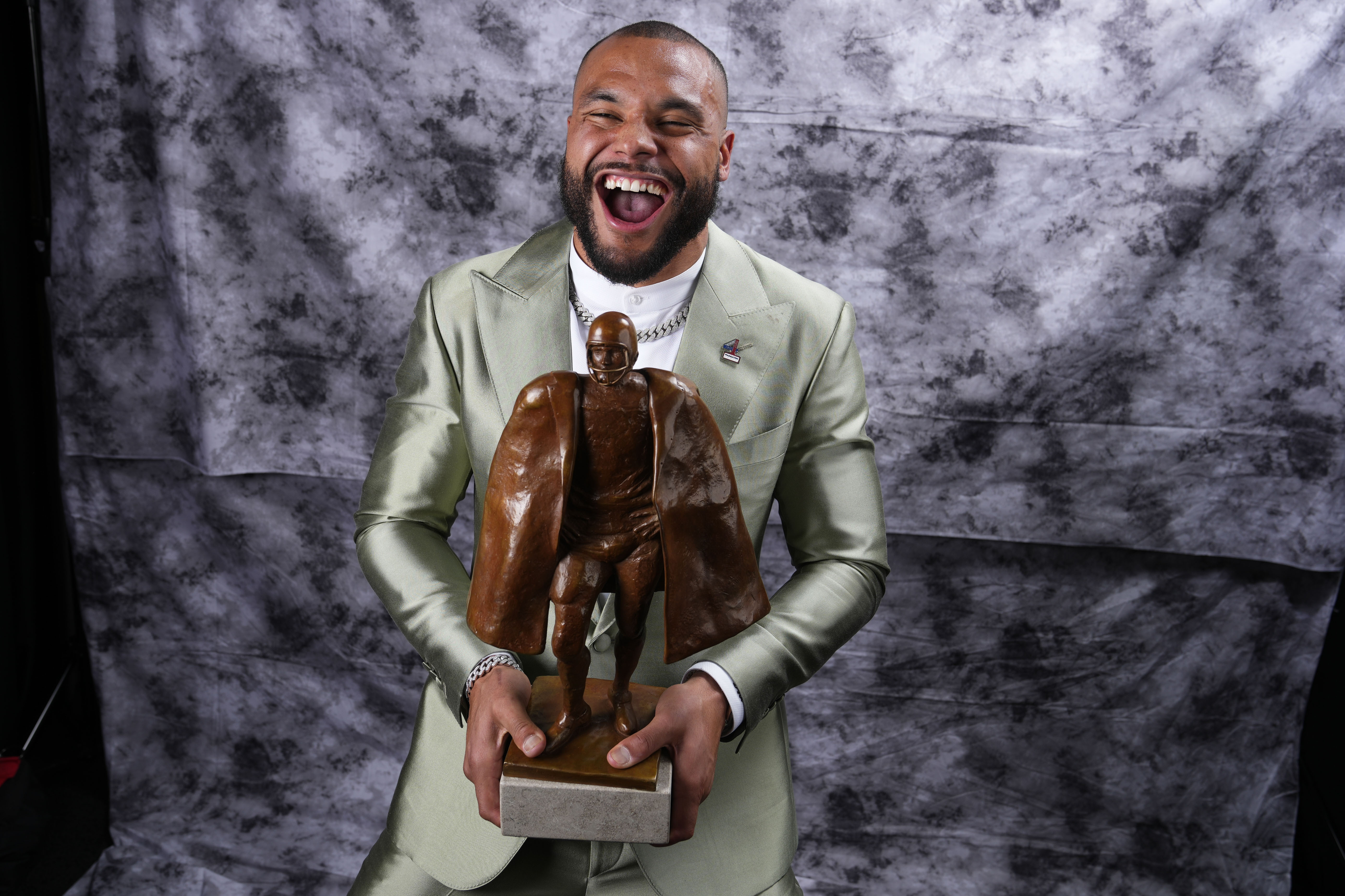Walter Manning Player of the Year Award winner, Dallas Cowboys' Dak Prescott, poses for a photo during the NFL Honors award show ahead of the Super Bowl 57 football game, Thursday, Feb. 9, 2023, in Phoenix. 