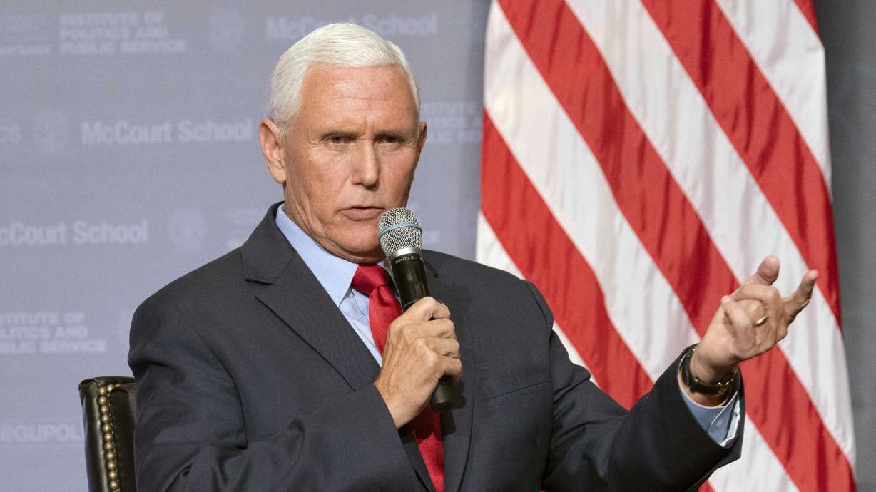 Former Vice President Mike Pence speaks to students at Georgetown University in Washington, Oct. 19, 2022. The FBI is searching Pence's Indiana home as part of a classified records probe Friday.