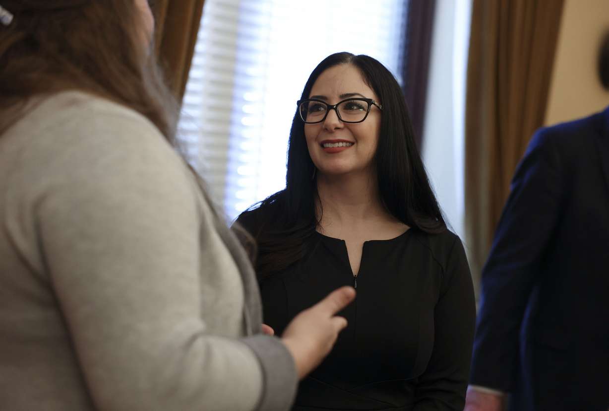 Gabriella Archuleta, Utah Mental Health Policy Committee co-chairperson, speaks with people after a gathering where February was declared Maternal Mental Health Month at the Capitol in Salt Lake City on Thursday.