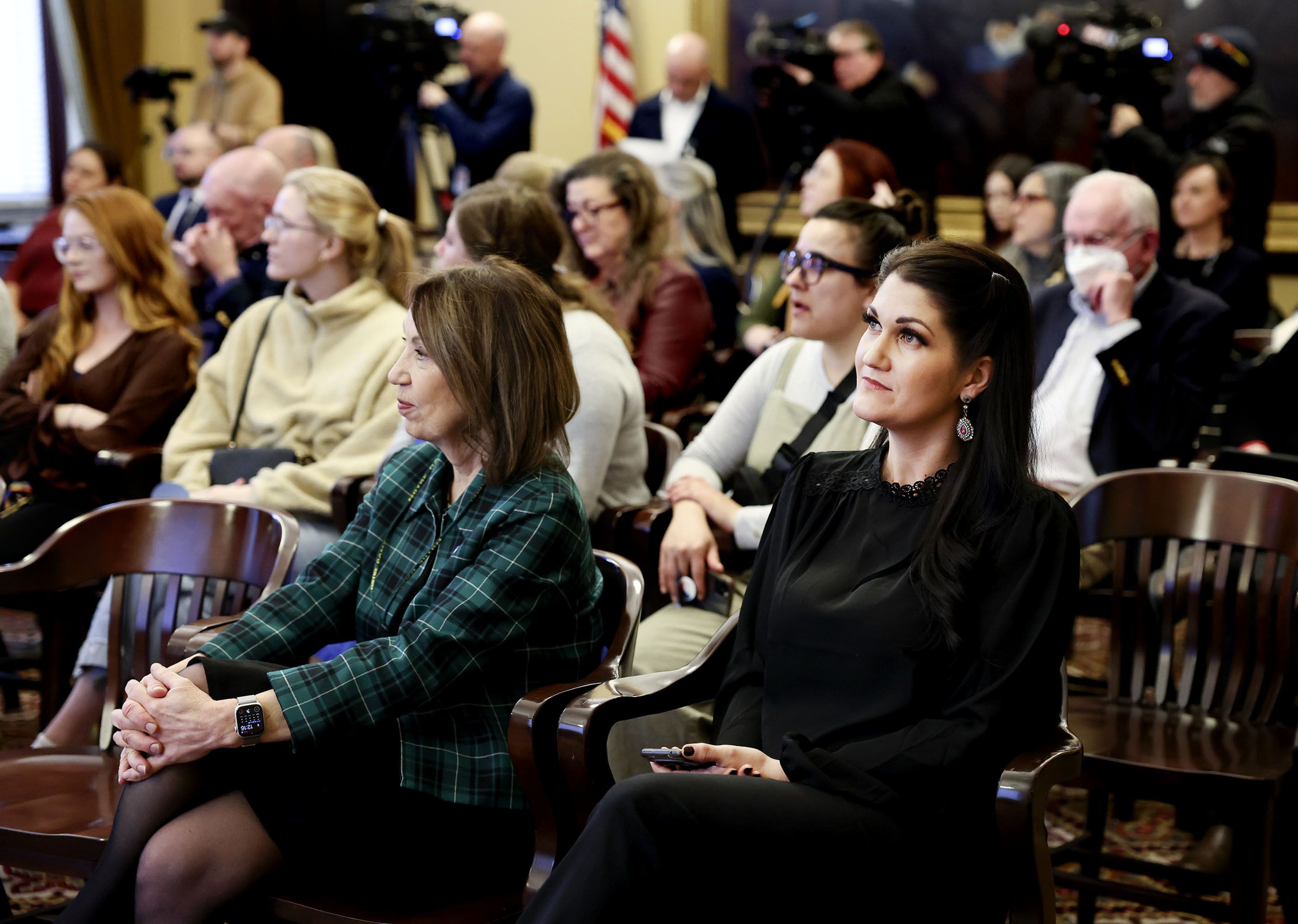 Rep. Rosemary Lesser, D-Ogden, left, and Rep. Ashlee Matthews, D-Salt Lake, attend a gathering where February was declared Maternal Mental Health Month at the Capitol in Salt Lake City on Thursday. HB84 and HB85, sponsored by Lesser, are bills she believes will benefit new mothers.