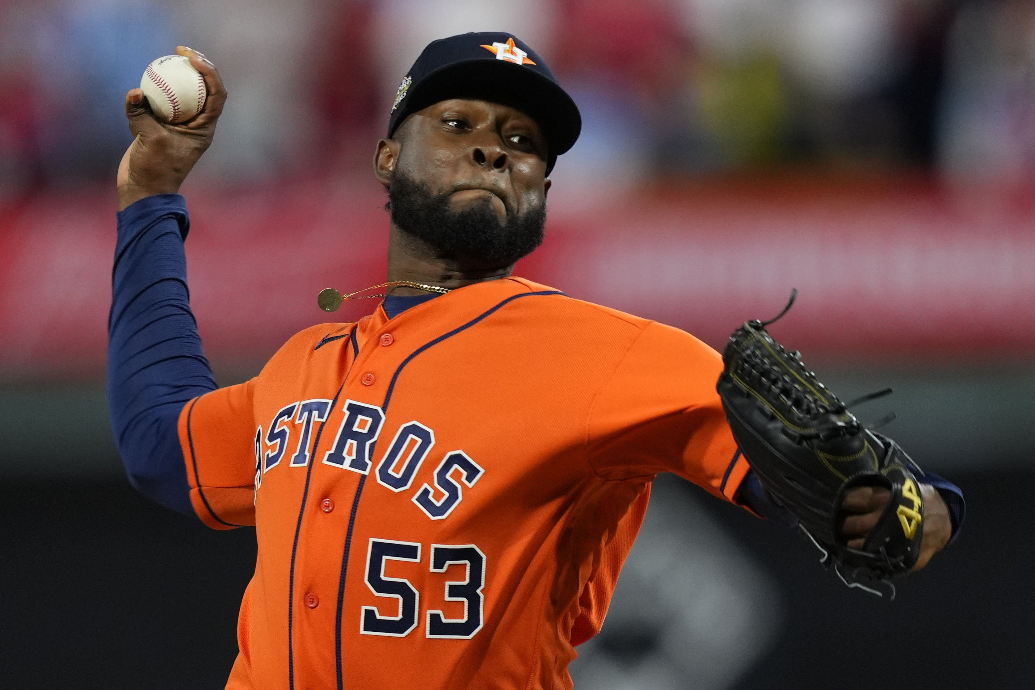FILE - Houston Astros starting pitcher Cristian Javier throws during the first inning in Game 4 of baseball's World Series against the Philadelphia Phillies, Nov. 2, 2022, in Philadelphia. Javier and the Astros agreed Friday, Feb. 10, 2023, to a $64 million, five-year contract that avoided a salary arbitration hearing.