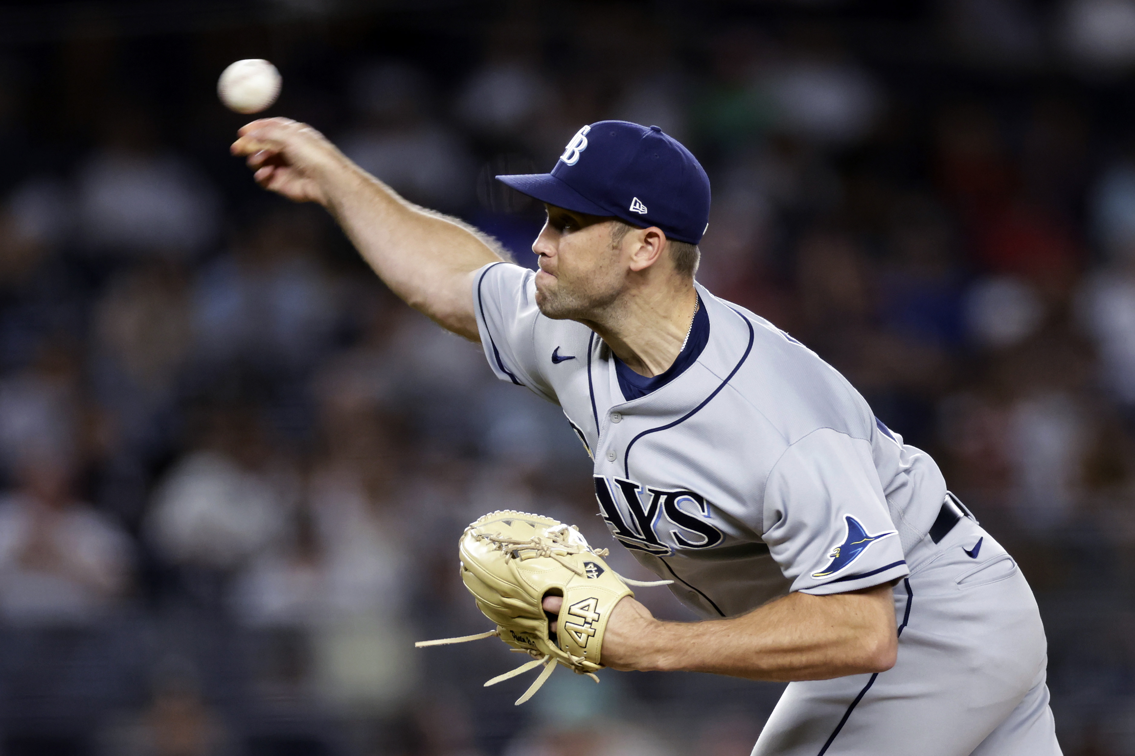 FILE - Tampa Bay Rays pitcher Jason Adam throws during the ninth inning of the team's baseball game against the New York Yankees on Monday, Aug. 15, 2022, in New York. Adam became the fourth Tampa Bay player to go to a salary arbitration hearing this year, asking a panel for $1,775,000 on Friday, Feb. 10, 2023, while the Rays argued for $1.55 million. 