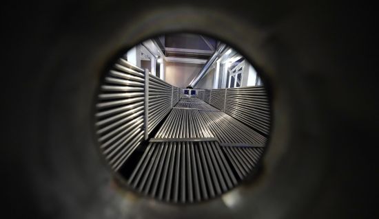 A cross-section of a prototype reactor is shown inside Last Energy's microreactor demonstration unit Jan. 17, in Brookshire, Texas. For the company's CEO, Bret Kugelmass, the urgency of the climate crisis means zero-carbon nuclear energy must be scaled up soon.