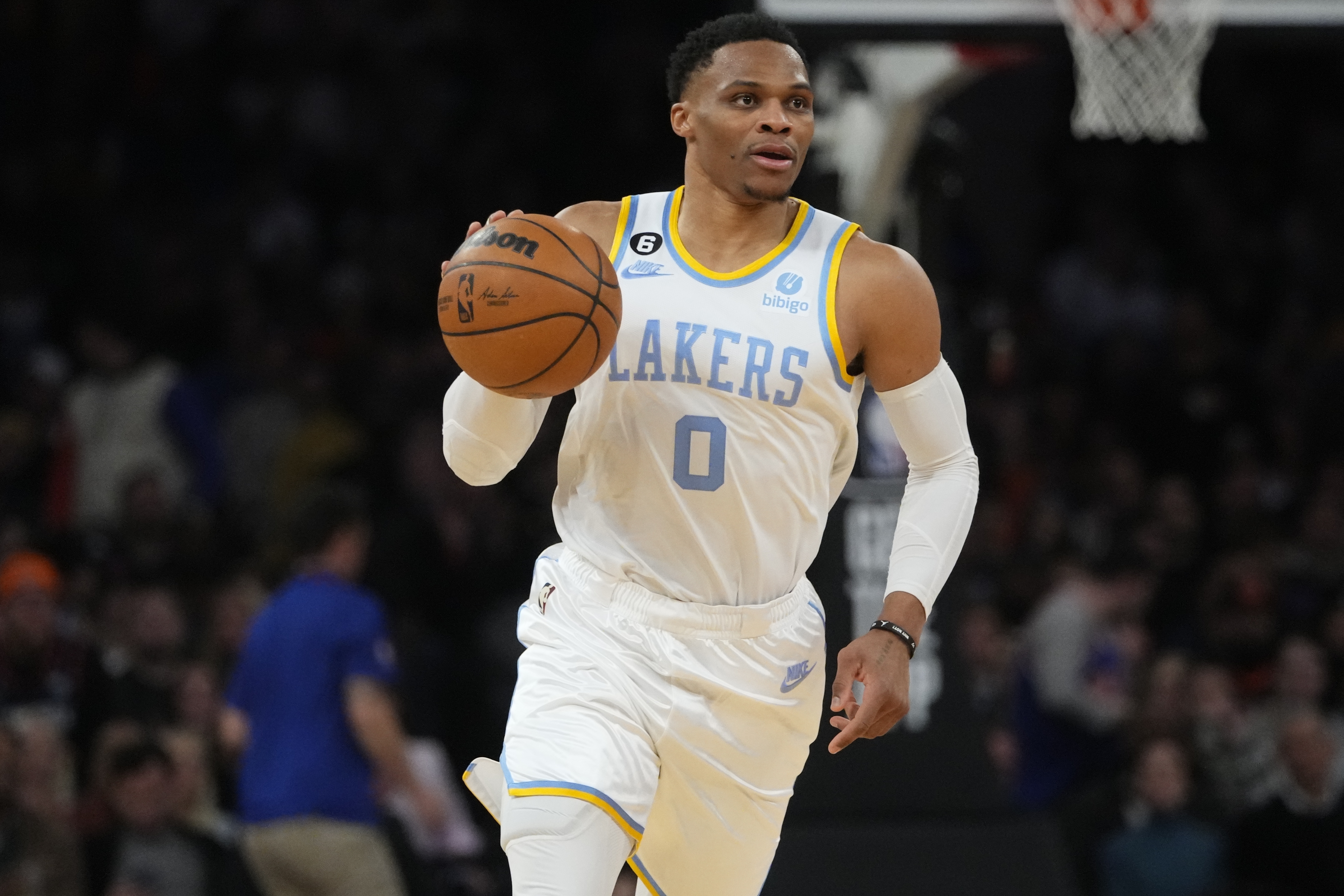 FILE - Los Angeles Lakers' Russell Westbrook brings the ball up during the second half of the team's NBA basketball game against the New York Knicks on Jan. 31, 2023, in New York. The Lakers traded Westbrook to the Utah Jazz and reacquired guard D'Angelo Russell from Minnesota in a three-team, eight-player deal Wednesday night, Feb. 8, ahead of the NBA's trade deadline, a person with knowledge of the trade told The Associated Press. 
