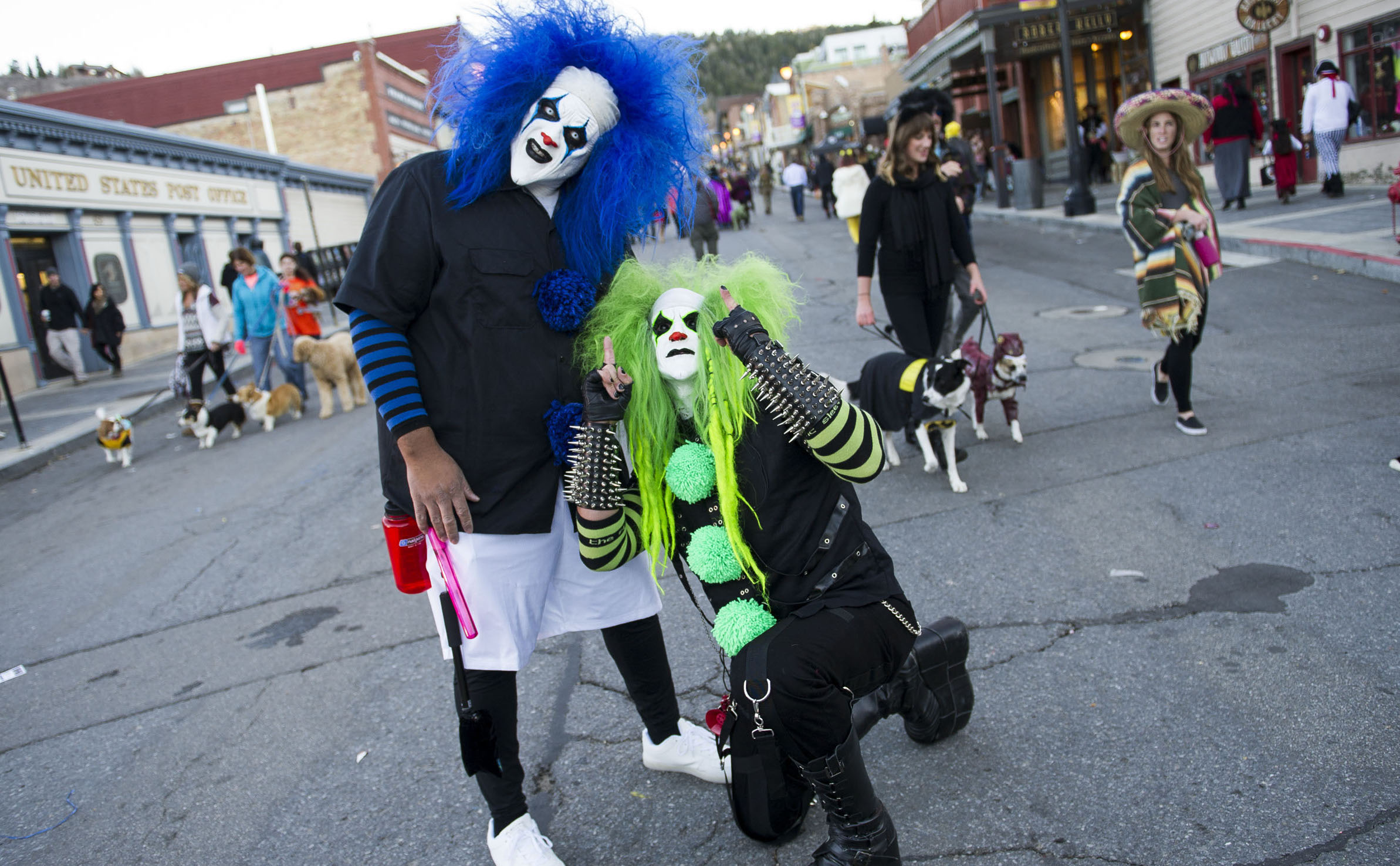Garth Vaz, left, and Doni Medici pose for a photo in Park City on Oct. 31, 2016. Lawmakers are considering when Utahns should celebrate Halloween.