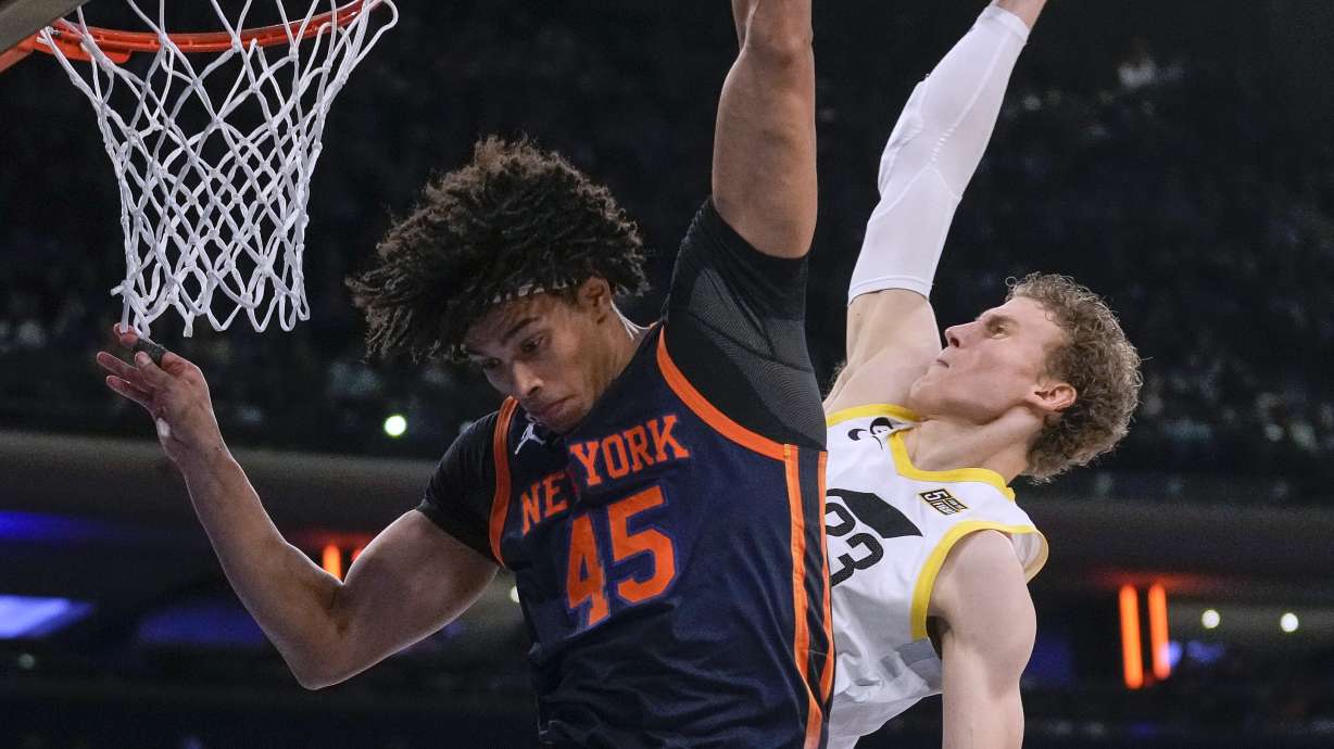 Utah Jazz forward Lauri Markkanen (23) shoots against New York Knicks center Jericho Sims (45) during the second half of an NBA basketball game Saturday, Feb. 11, 2023, in New York.