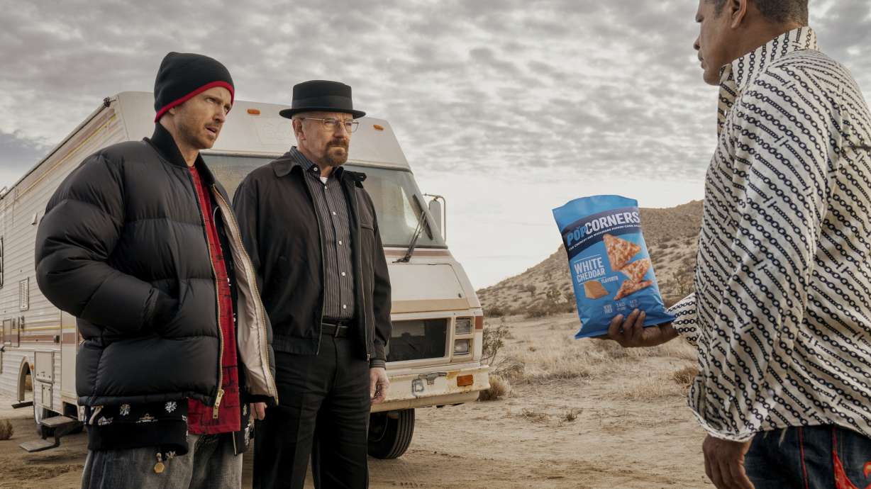 This photo provided by Frito-Lay shows Aaron Paul, Bryan Cranston and Raymond Cruz in scene from PopCorners 2023 Super Bowl NFL football spot.