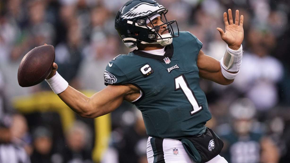 FILE - Philadelphia Eagles quarterback Jalen Hurts passes during the first half of the NFC Championship NFL football game between the Philadelphia Eagles and the San Francisco 49ers on Sunday, Jan. 29, 2023, in Philadelphia. The Chiefs and Eagles are bringing MVP finalists Patrick Mahomes and Jalen Hurts to the Super Bowl to cap a season in which the NFL had a glaring amount of instability at quarterback.
