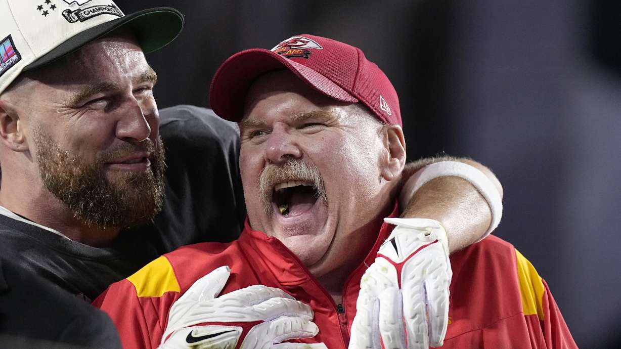 Kansas City Chiefs tight end Travis Kelce, left, and head coach Andy Reid celebrate victory over the Philadelphia Eagles after the NFL Super Bowl 57 football game, Sunday, Feb. 12, 2023, in Glendale, Ariz. The Kansas City Chiefs defeated the Philadelphia Eagles 38-35.