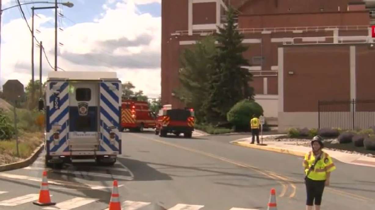 Mars Wrigley is fined after two workers fell into a tank of chocolate at its Pennsylvania factory last June. First responders at the Mars Wrigley plant in Elizabethtown in June after the incident.