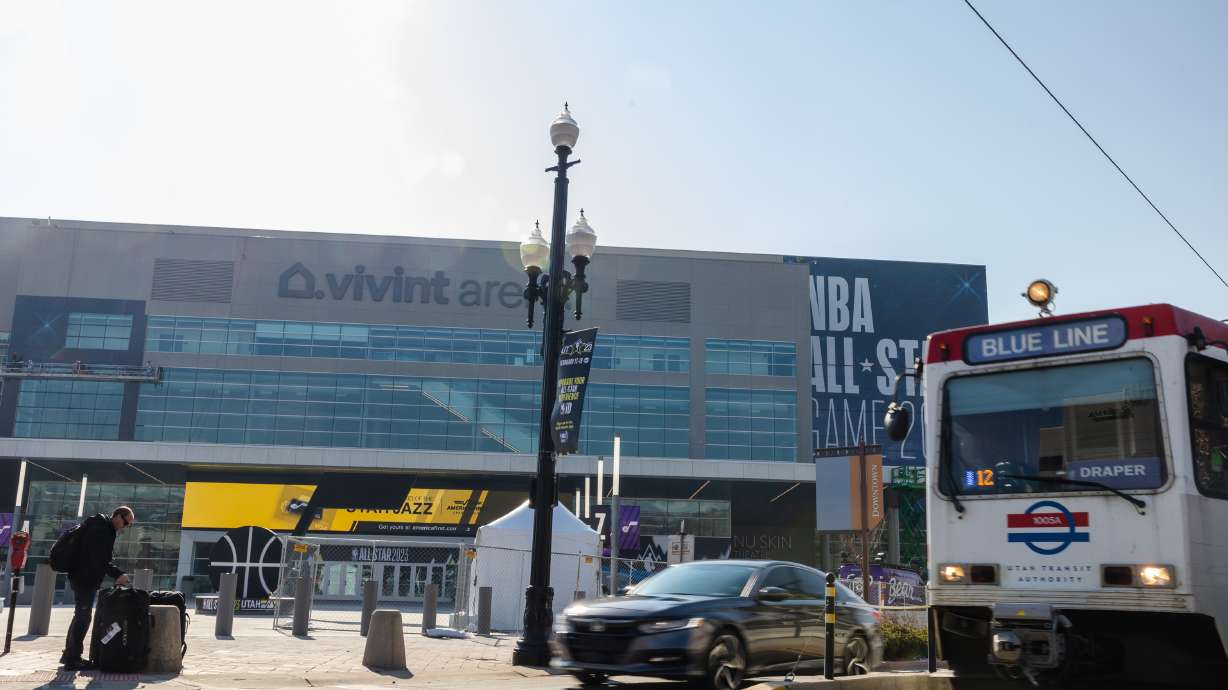 A Utah TRAX Blue Line train prepares to pass by Vivint Arena in Salt Lake City on Monday. The NBA has partnered with the Utah TRAX system for shuttle service in preparation for the 2023 All-Star Weekend.