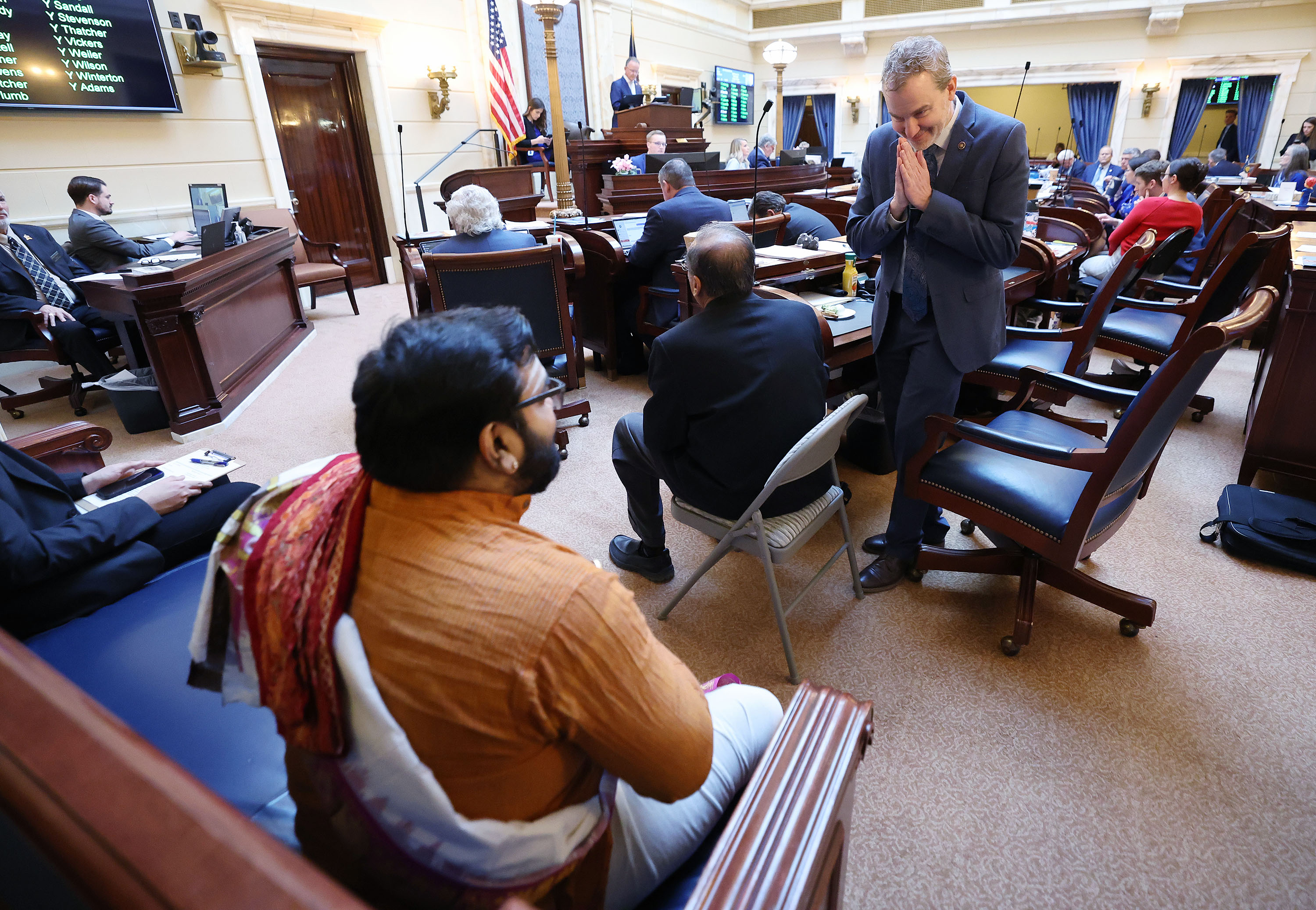 Sen. Lincoln Fillmore, R-South Jordan, gestures to Hindu Priest Sathish Kumar Niyarthi after speaking about SB46, which would make Diwali a state commemorative day, at the Capitol in Salt Lake City on Feb. 3.