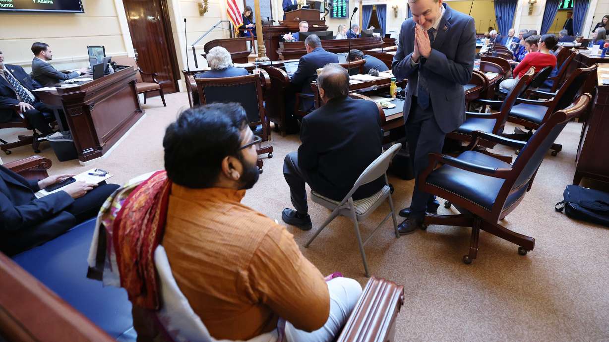 Sen. Lincoln Fillmore, R-South Jordan, gestures to Hindu Priest Sathish Kumar Niyarthi after speaking about SB46, which would make Diwali a state commemorative day, at the Capitol in Salt Lake City on Feb. 3.