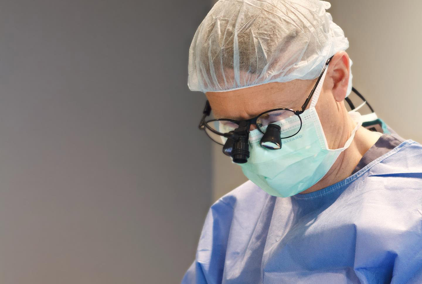 Dr. Travis Peterson performing surgery.