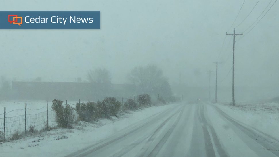 A snow squall causes near-whiteout conditions on Industrial Road in Cedar City during the early afternoon of Tuesday.