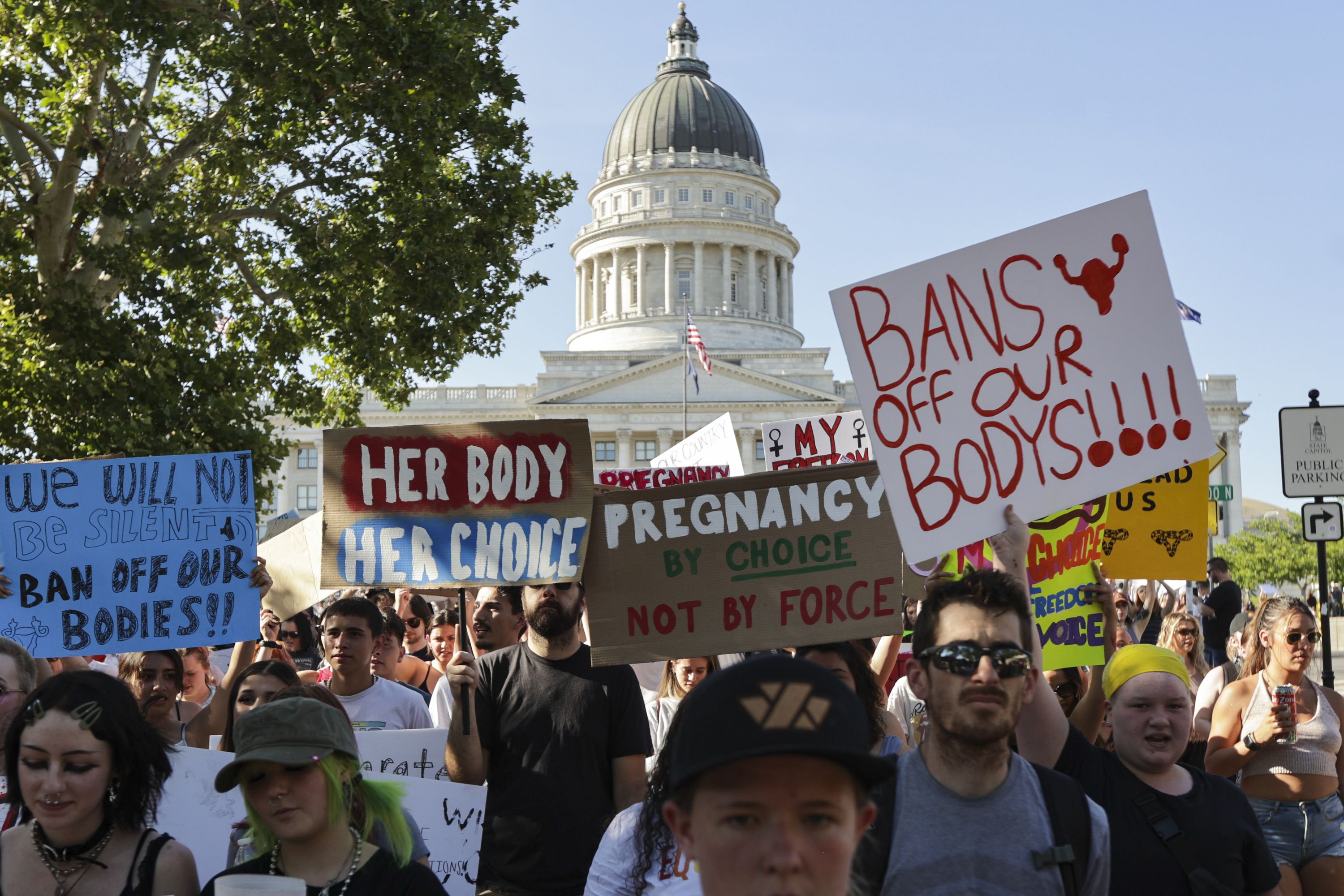 Hundreds of protesters walk from the state Capitol to Washington Square Park in Salt Lake City on June 26, 2022, after the Supreme Court overturned Roe v. Wade.