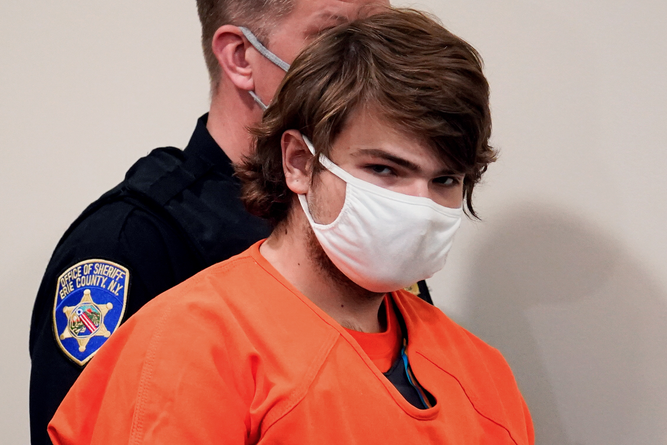 Payton Gendron is led into the courtroom for a hearing at Erie County Court, in Buffalo, N.Y., on May 19, 2022. The white supremacist was sentenced to life in prison Wednesday for killing 10 Black people at a Buffalo supermarket.
