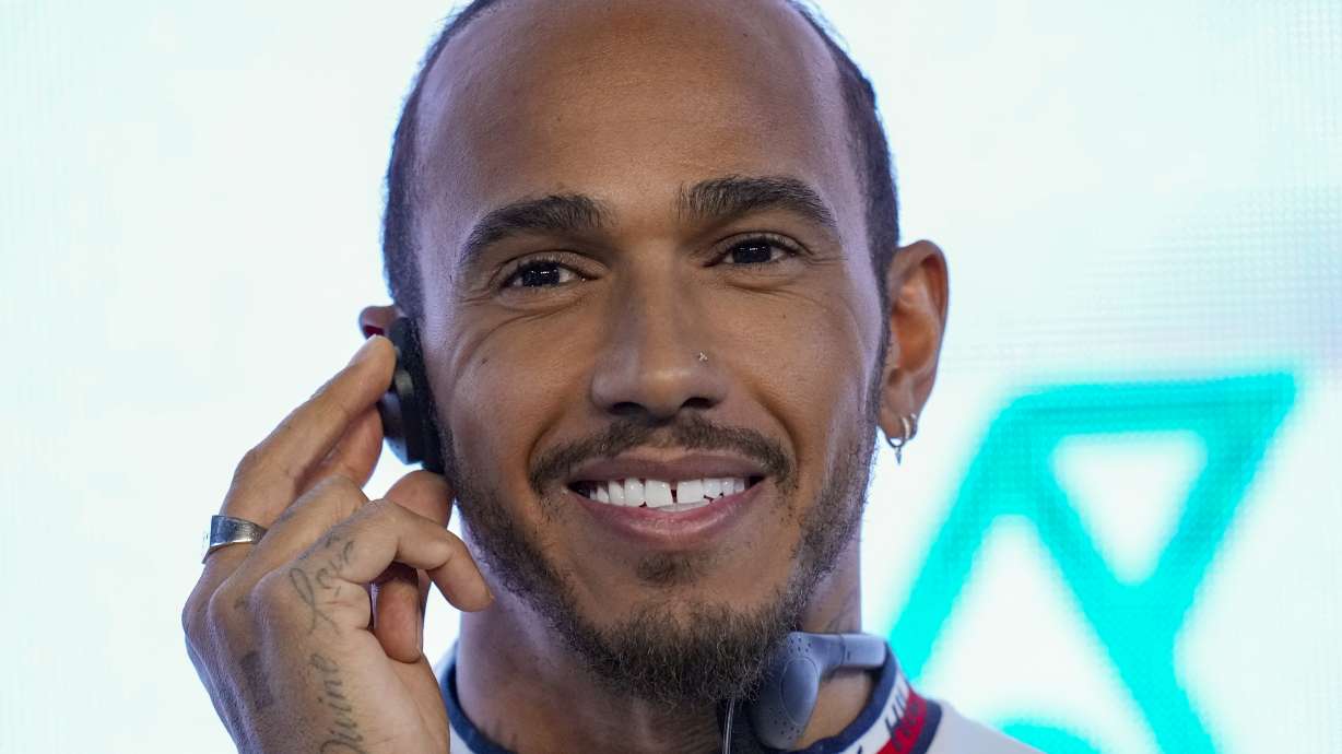 FILE - Mercedes driver Lewis Hamilton of Britain listens to a question during a press conferencein Sao Paulo, Brazil, on Nov. 9, 2022. Seven-time Formula One champion Lewis Hamilton insisted he will not be silenced by offseason rules that prohibit drivers from speaking out on political issues. Hamilton said Wednesday Feb. 15, 2023 he will continue to use his global platform to promote his wide-ranging interests, which include social justice and race, human rights and protection of the LBGTQ community.