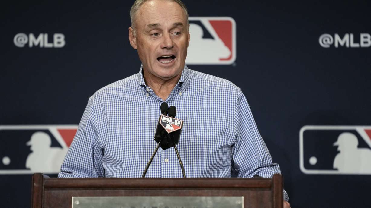 Major League Baseball Commissioner Robert Dean Manfred Jr. answers questions at spring training media day Wednesday, Feb. 15, 2023, in Phoenix.