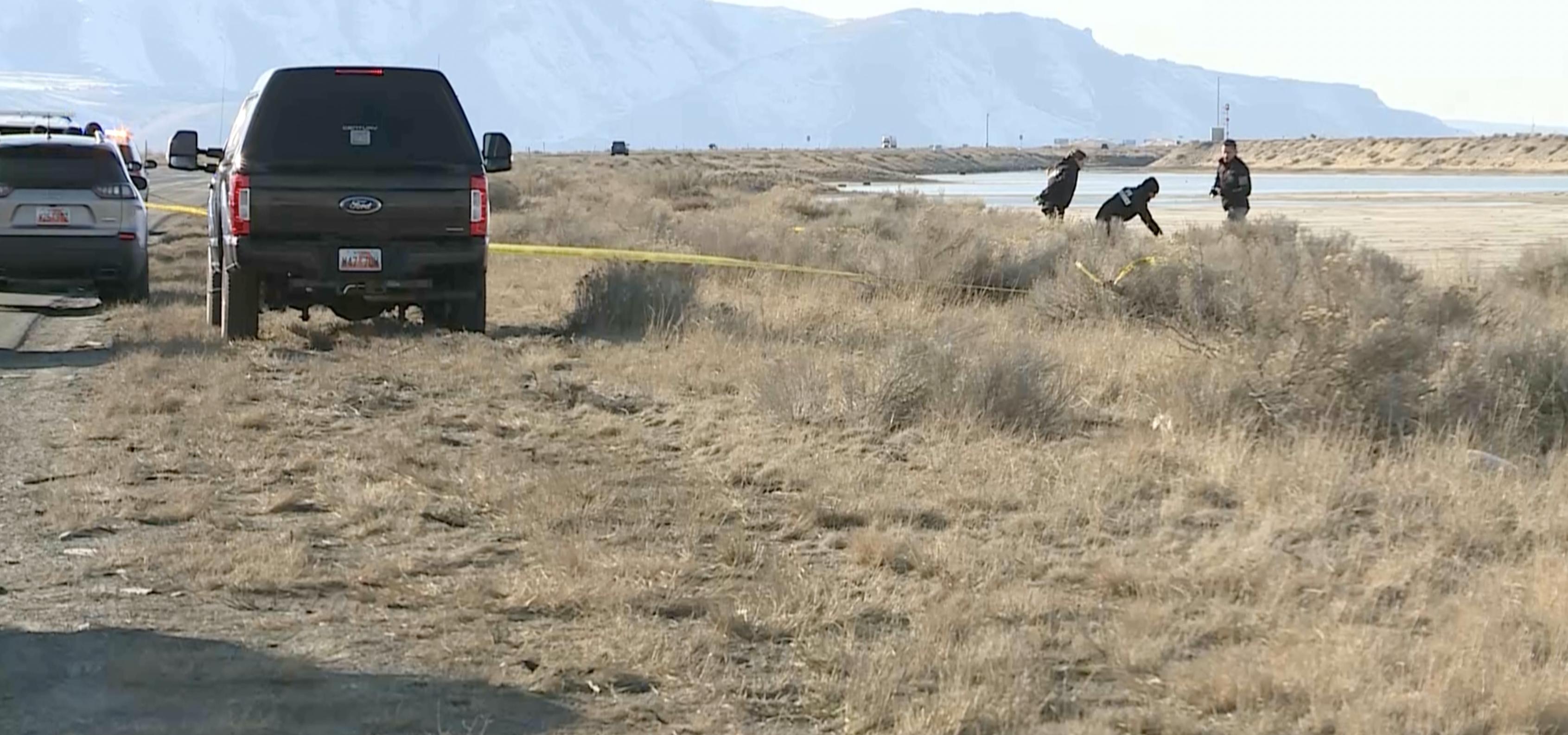 Police investigate the area where the body of a middle-aged man was found along I-80, about 2 miles west of the turnoff toward Grantsville, in Tooele County on Feb. 15.