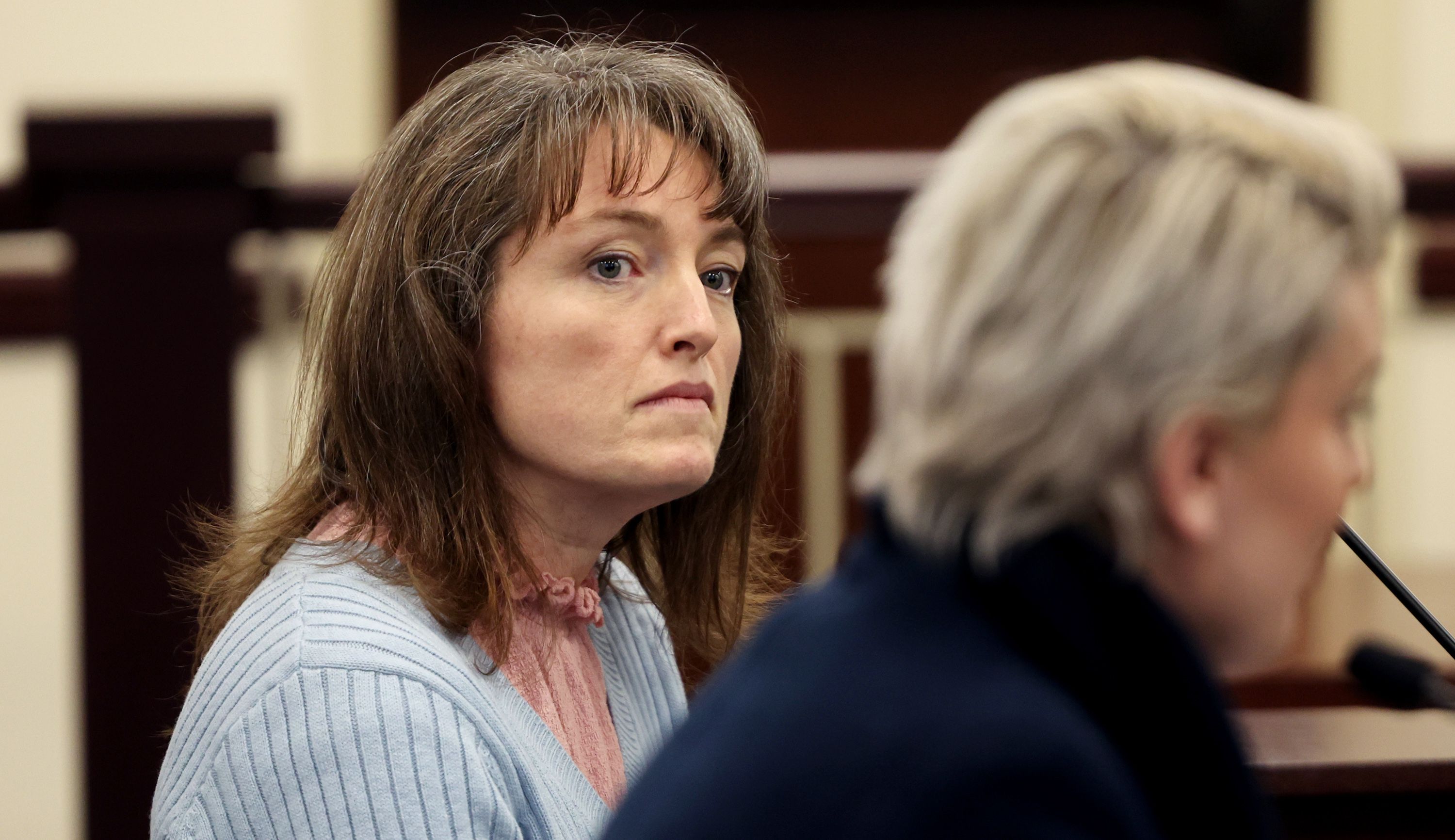 Nicholeen Peck listens to testimony in the House Judiciary committee on HB0467 and HB297 at the Capitol on Wednesday.