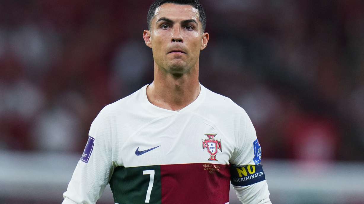 FILE - Portugal's Cristiano Ronaldo pauses during the World Cup quarterfinal soccer match between Morocco and Portugal in Doha, Qatar, Dec. 10, 2022. A Las Vegas lawyer has been hit with a $335,000 penalty for pressing a bid in U.S. courts to force Ronaldo to pay millions of dollars more than the $375,000 in hush money he paid to a Nevada woman who claimed the international soccer star raped her in Las Vegas in 2009.