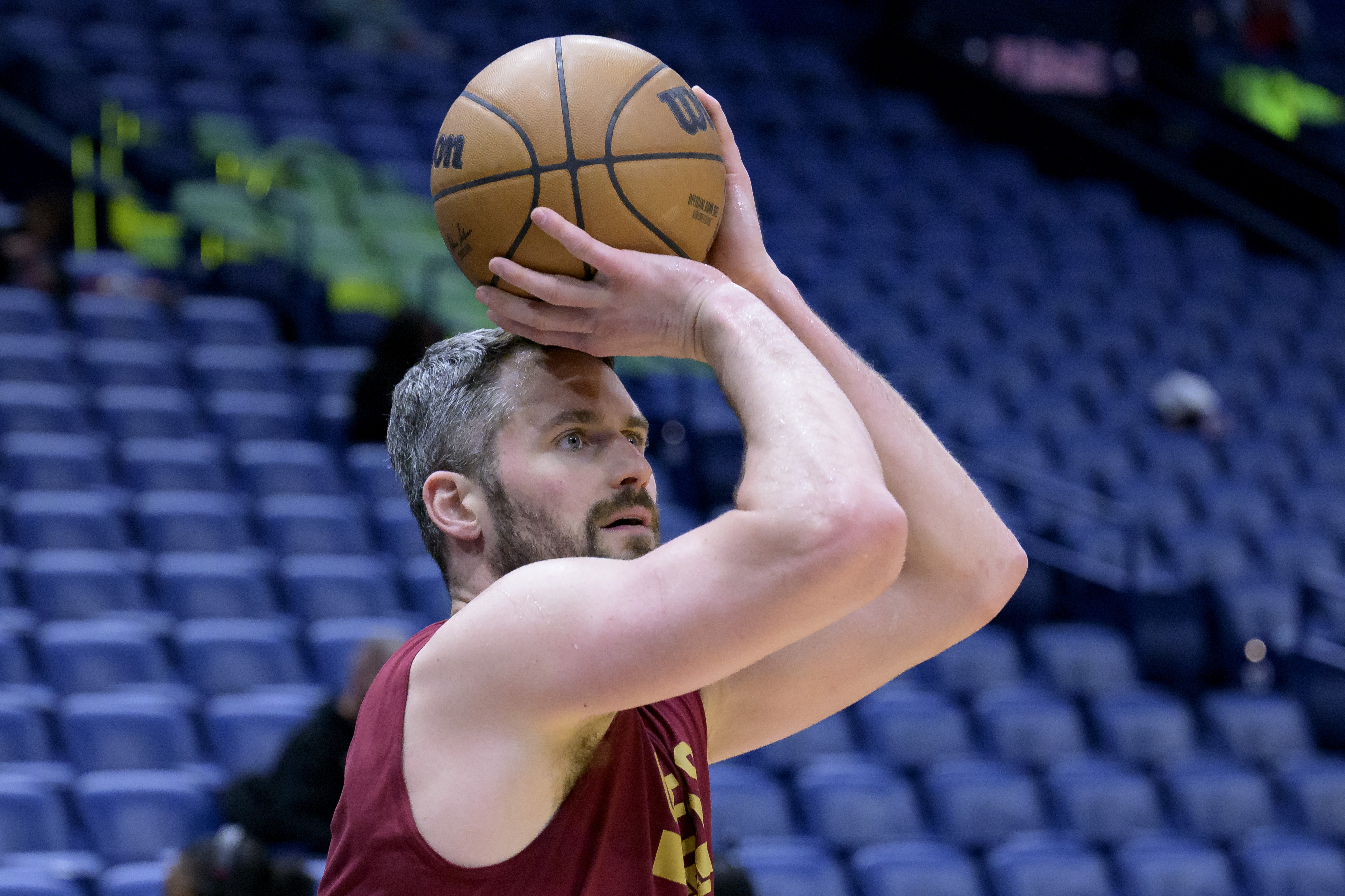 Cleveland Cavaliers forward Kevin Love warms up before an NBA basketball game against the New Orleans Pelicans in New Orleans, Friday, Feb. 10, 2023. 