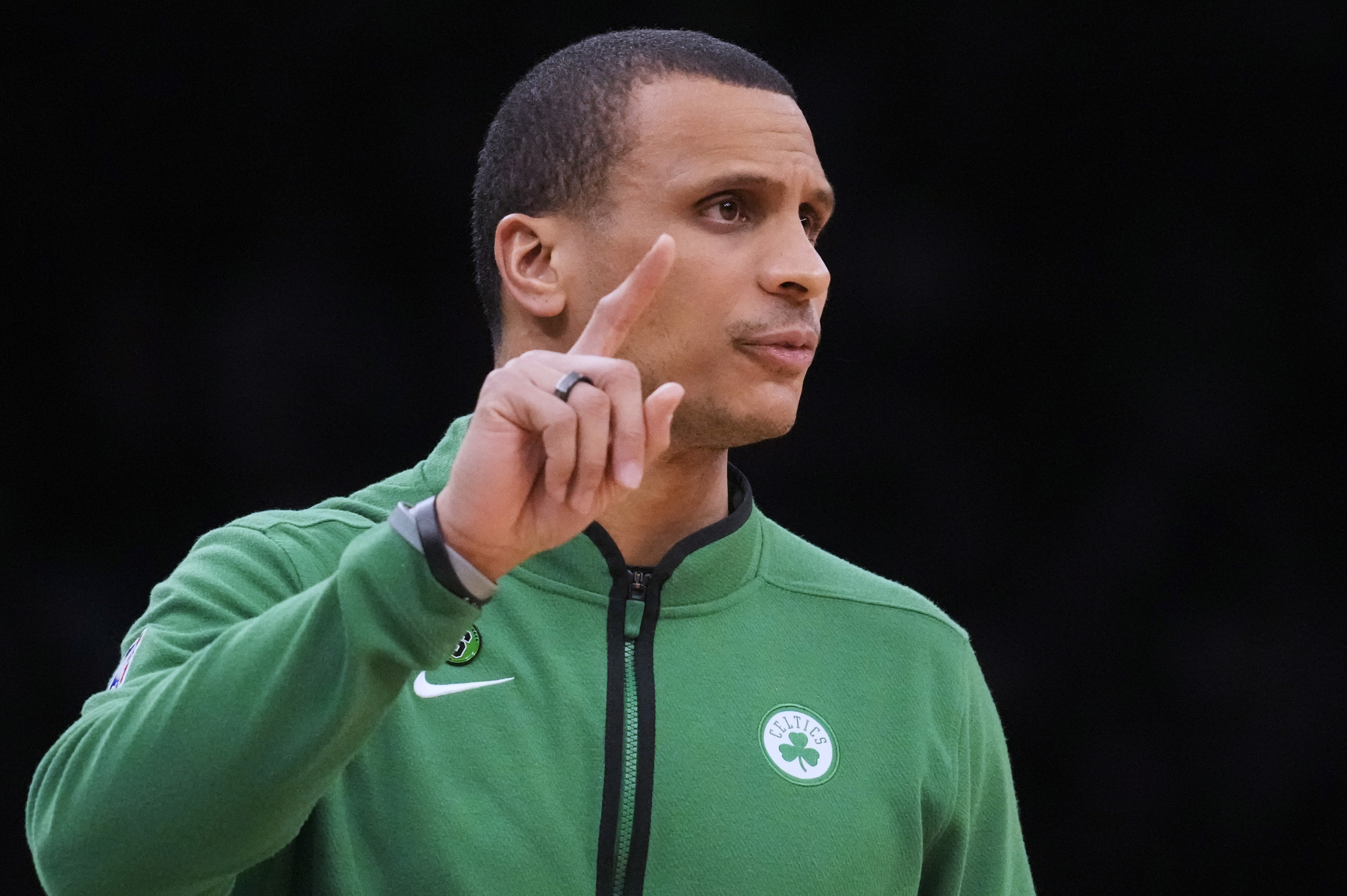 Boston Celtics interim head coach Joe Mazzulla calls to his players during the first half of an NBA basketball game against the Detroit Pistons, Wednesday, Feb. 15, 2023, in Boston. 