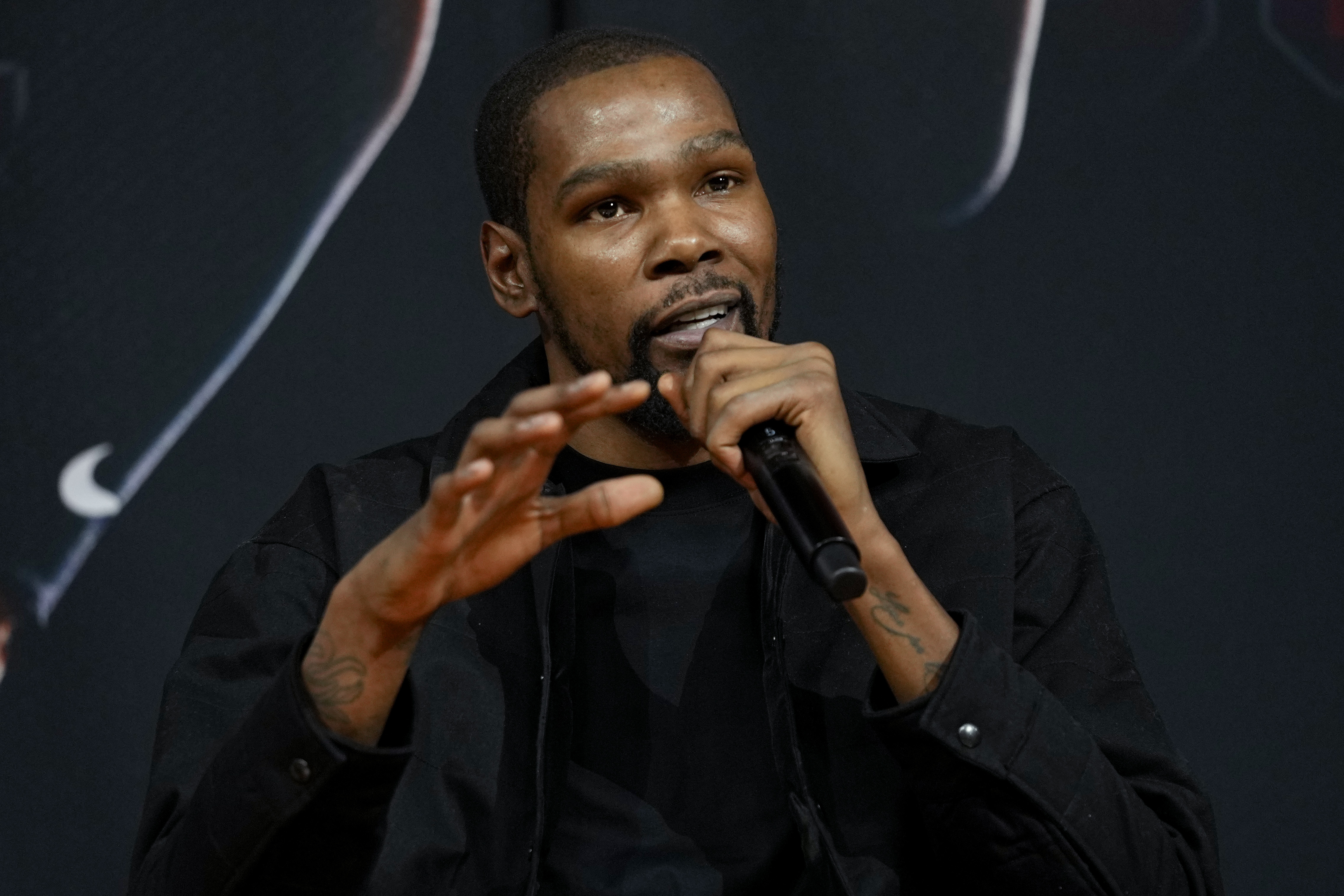 Phoenix Suns forward Kevin Durant, speaks to the media after being introduced during an NBA basketball team availability, Thursday, Feb. 16, 2023, in Phoenix. 