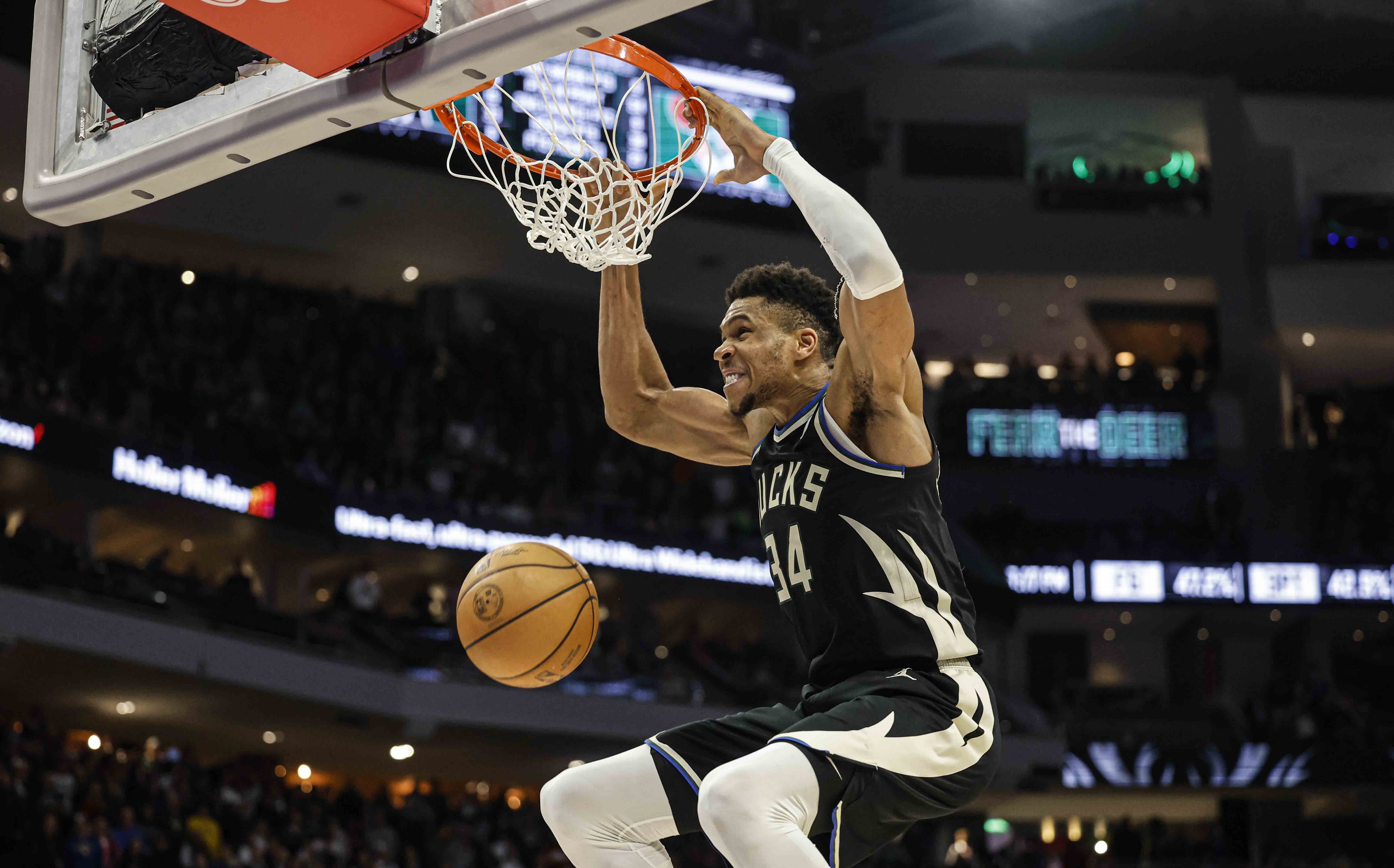 Milwaukee Bucks forward Giannis Antetokounmpo (34) dunks against the Boston Celtics during an NBA basketball game, Tuesday, Feb. 14, 2023, in Milwaukee. 