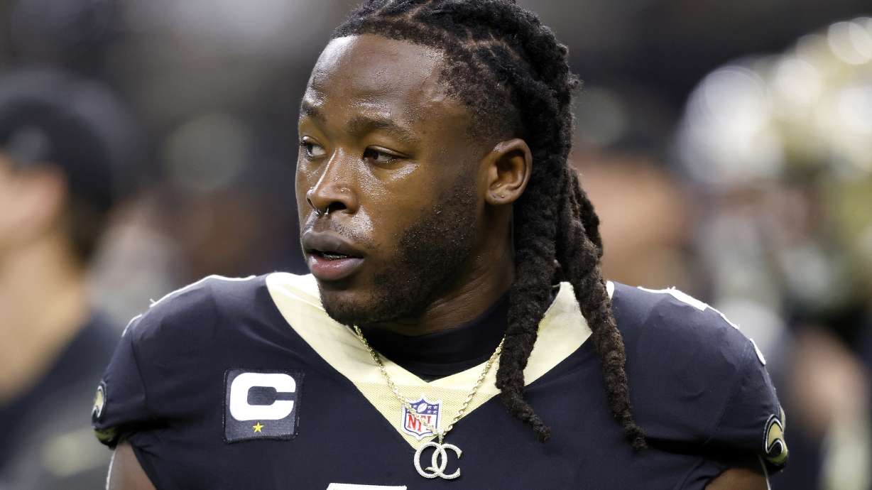 FILE - New Orleans Saints running back Alvin Kamara warms up for the team's NFL football game against the Las Vegas Raiders, Oct. 30, 2022, in New Orleans. A grand jury in Nevada has indicted Kamara, Cincinnati Bengals newly acquired cornerback Chris Lammons and two others on two criminal counts in connection with an alleged beating at a Las Vegas nightclub last February.